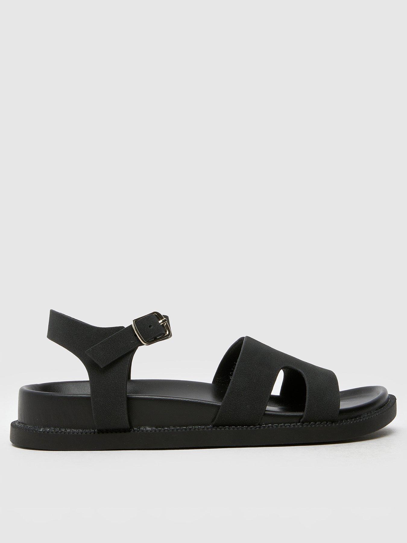 Image 1 of 4 of Schuh Junior Tippi Footbed Sandals - Black