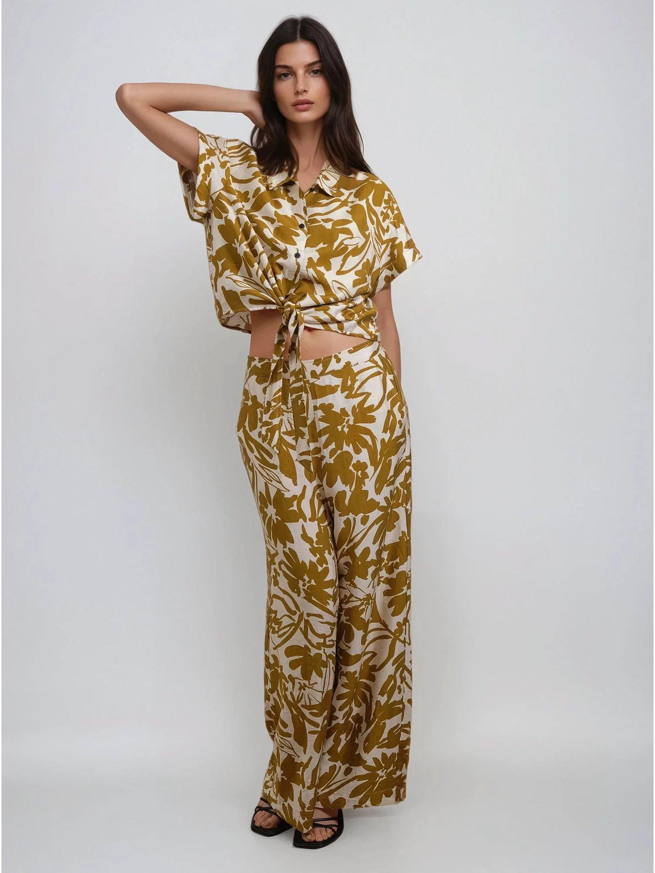 religion-element-trousers-in-bright-floral-print-yellowback