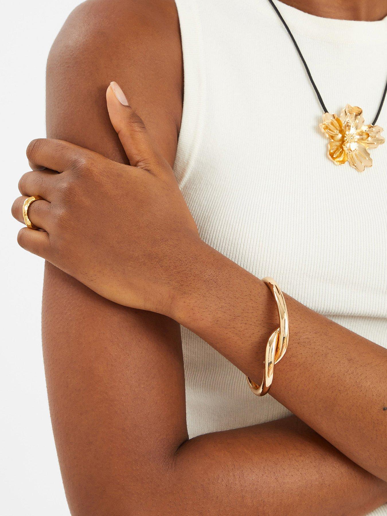 Image 2 of 3 of Accessorize Twist Knot Bangle Gold