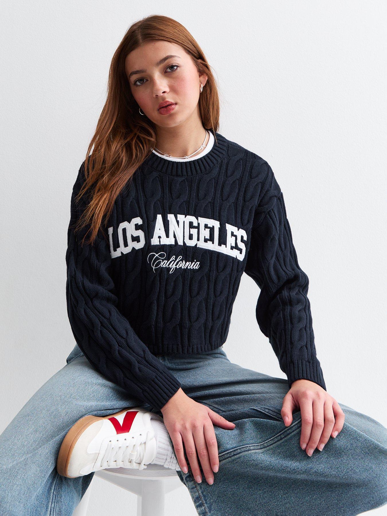 Image 1 of 4 of New Look 915 Girls Navy Los Angeles Slogan Cable Knit Jumper - Blue