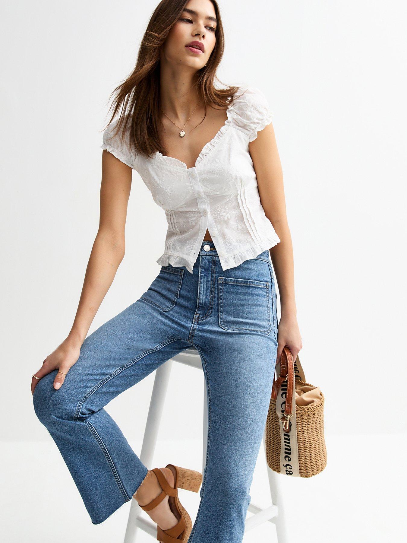 Image 5 of 6 of New Look Blue Patch Pocket Kick Flare Denim Jeans
