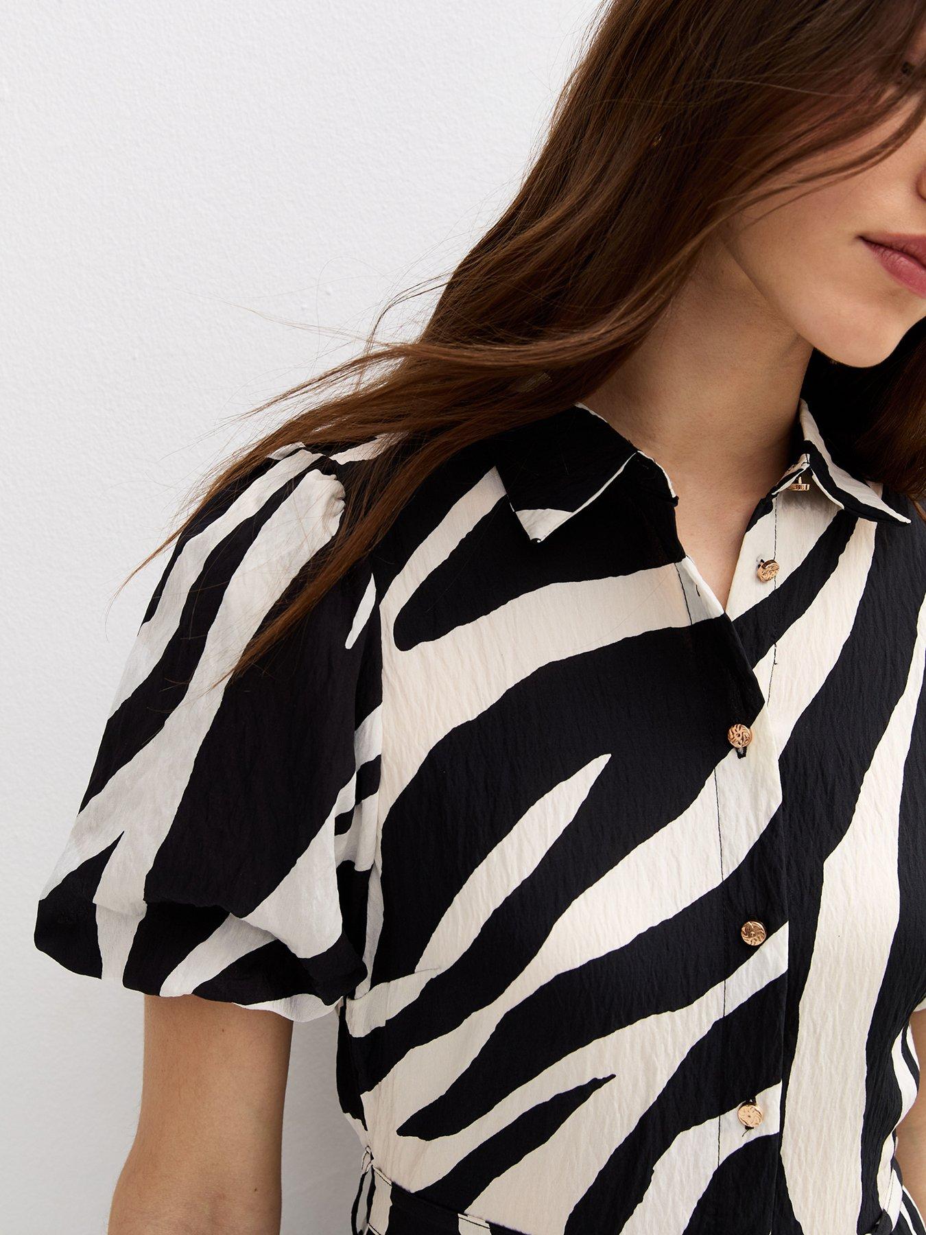 Image 4 of 5 of New Look Ziggy Zebra Puff Shirt Midi - Black