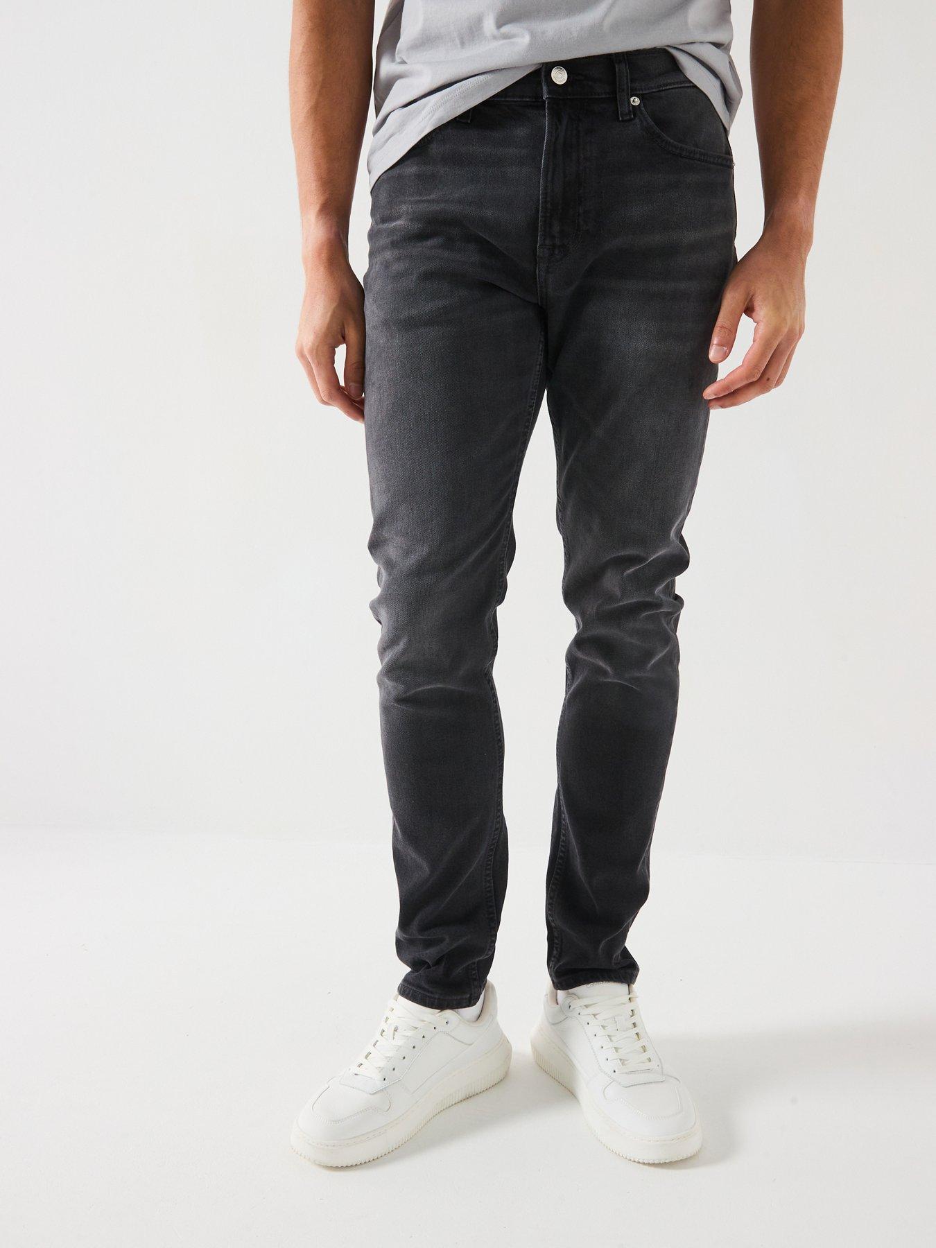 Image 1 of 6 of Calvin Klein Jeans Calvin Klein Jeans Slim Taper Jeans - Black