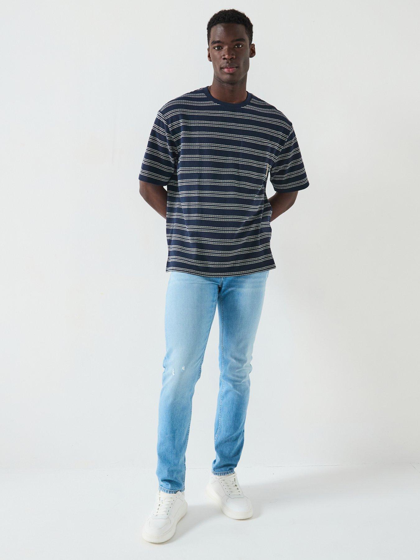 calvin-klein-jeans-slim-taper-light-washback