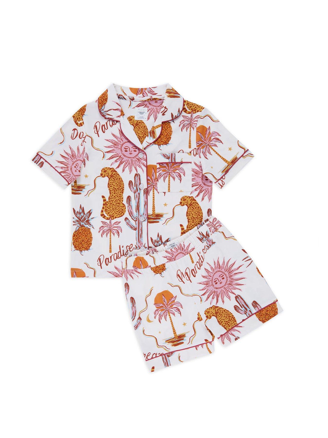 Image 2 of 3 of CHELSEA PEERS Unisex Kids Daydreamer Paradise Print Short Sleeve Revere And Short Pyjama Set - Cream