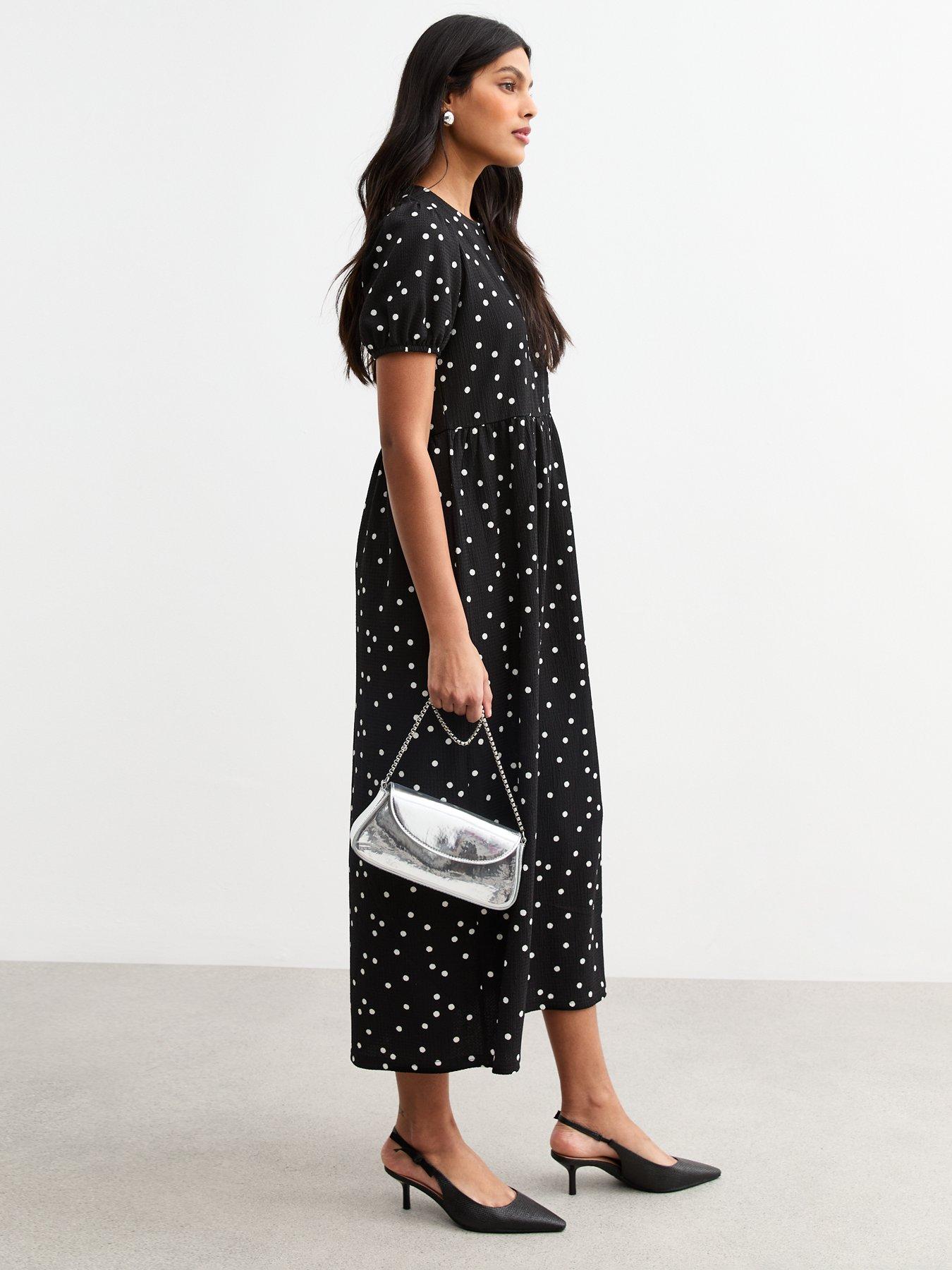 Image 3 of 4 of New Look Crinkled Jersey Polka Dot Bow Back Midi Dress - Black