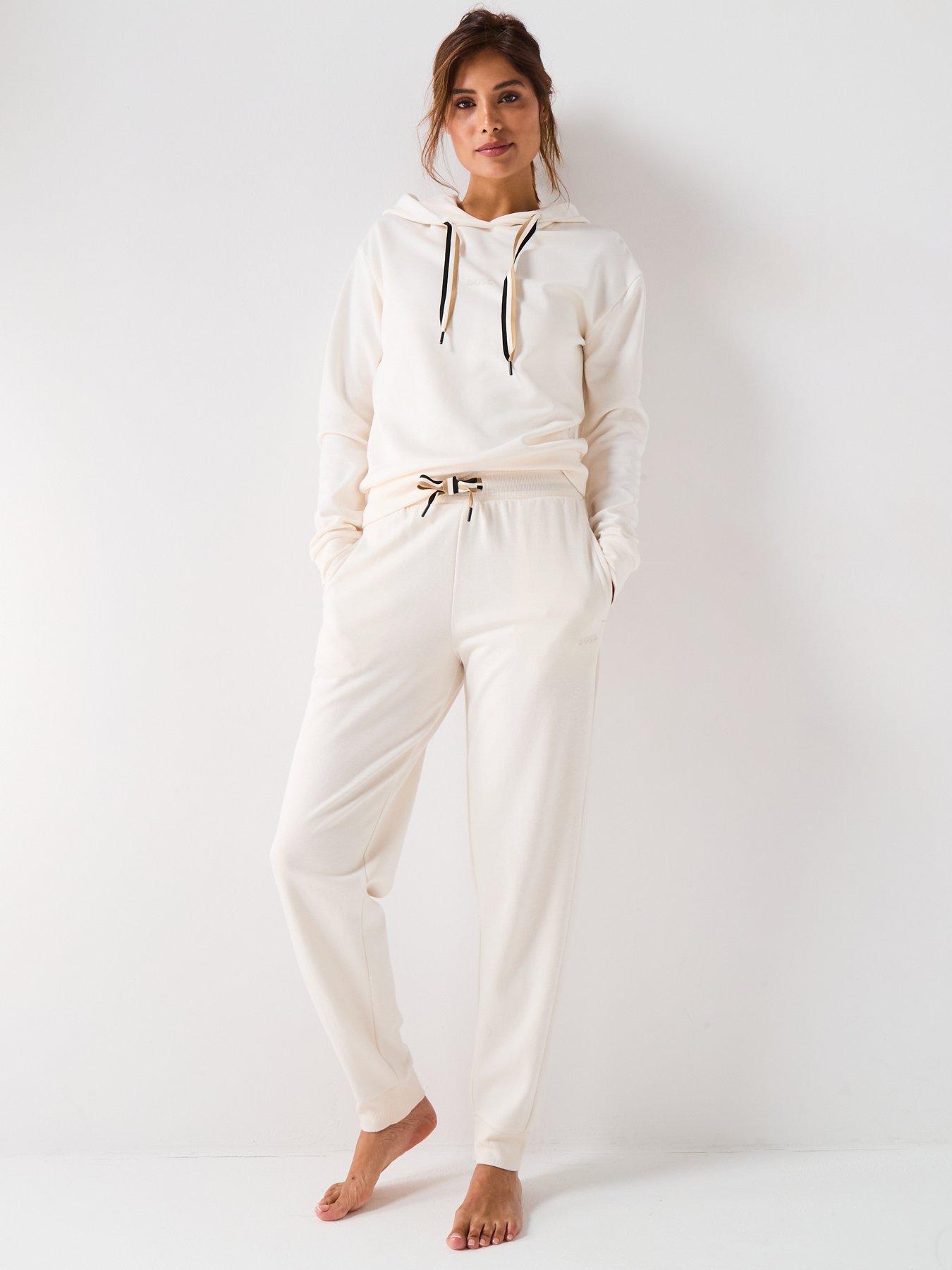 Image 3 of 4 of BOSS Cuffed Tracksuit Bottoms With Signature Stripe Drawcord - Cream