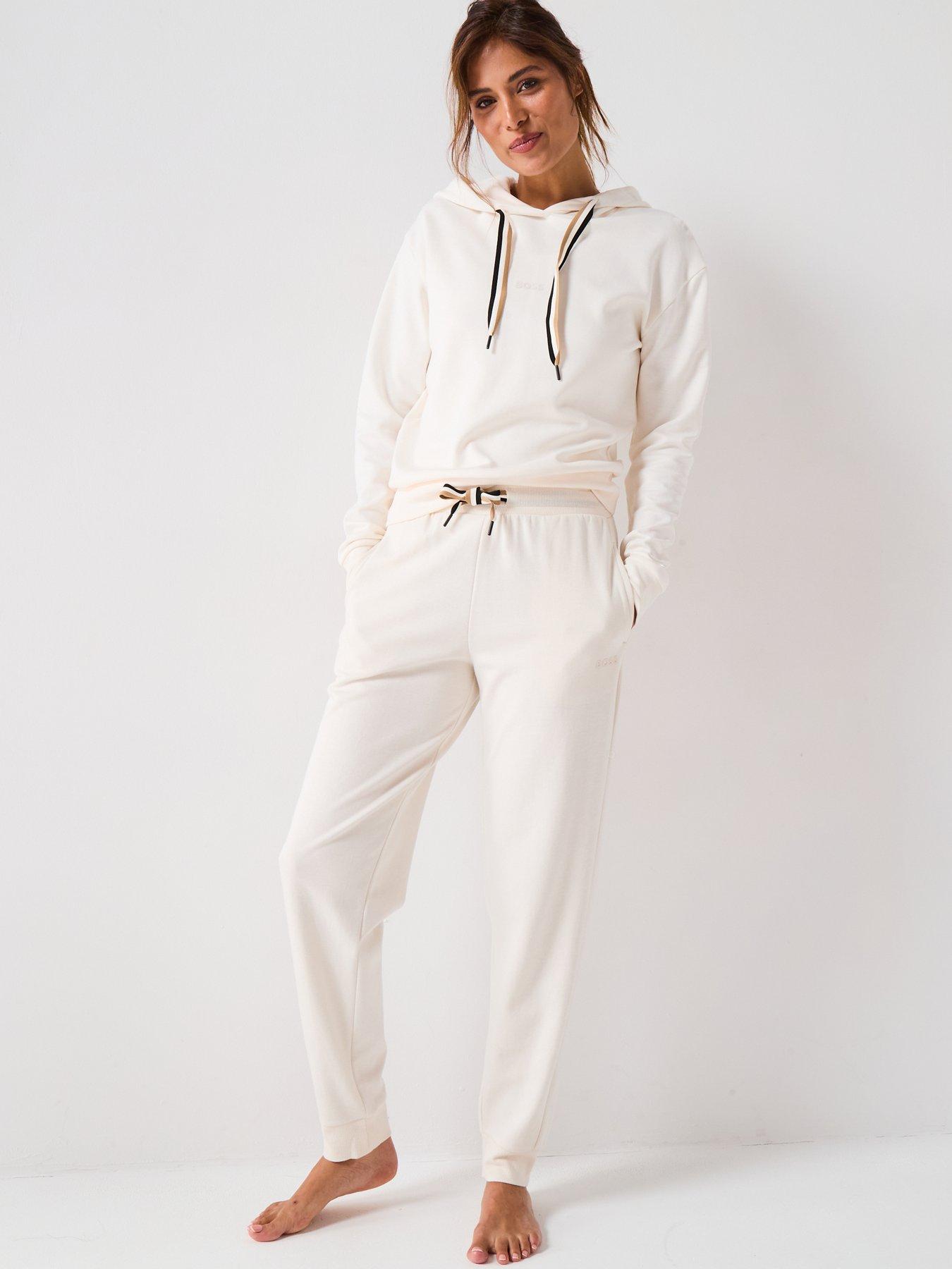 Image 4 of 4 of BOSS Cuffed Tracksuit Bottoms With Signature Stripe Drawcord - Cream