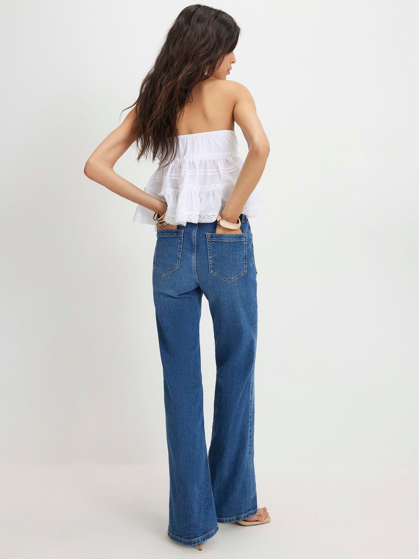 Image 2 of 4 of River Island Relaxed High Rise Flare Jeans&nbsp;- Medium Denim&nbsp;Blue