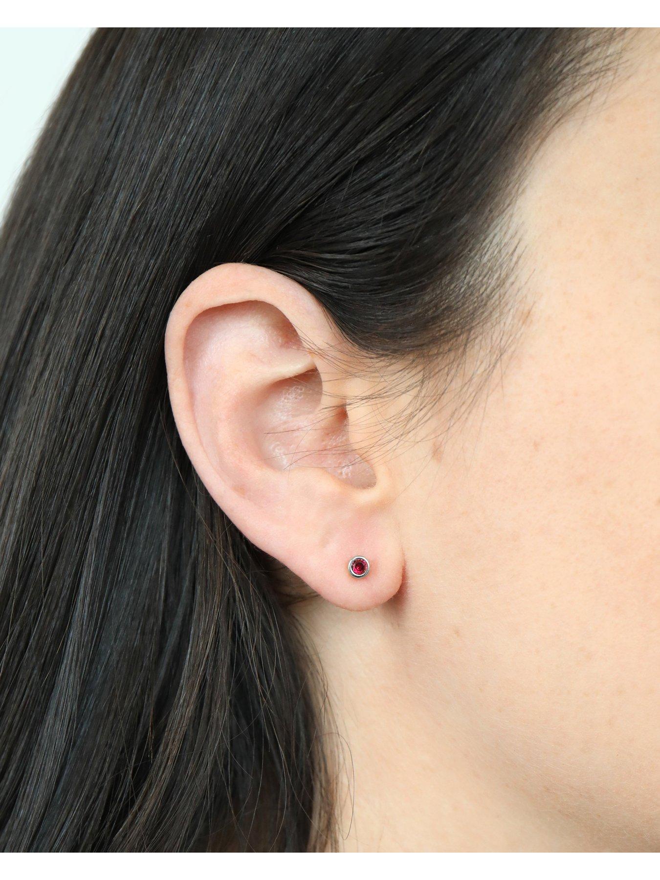 Image 2 of 3 of The Love Collection Sterling Silver Birthstone CZ Rubover Stud Earrings