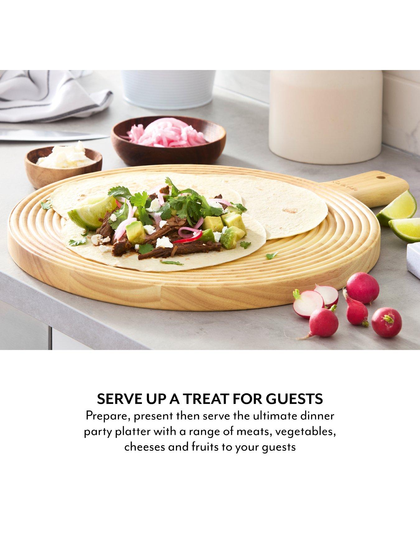 sur-la-table-large-round-paddle-serving-board--hevea-woodoutfit