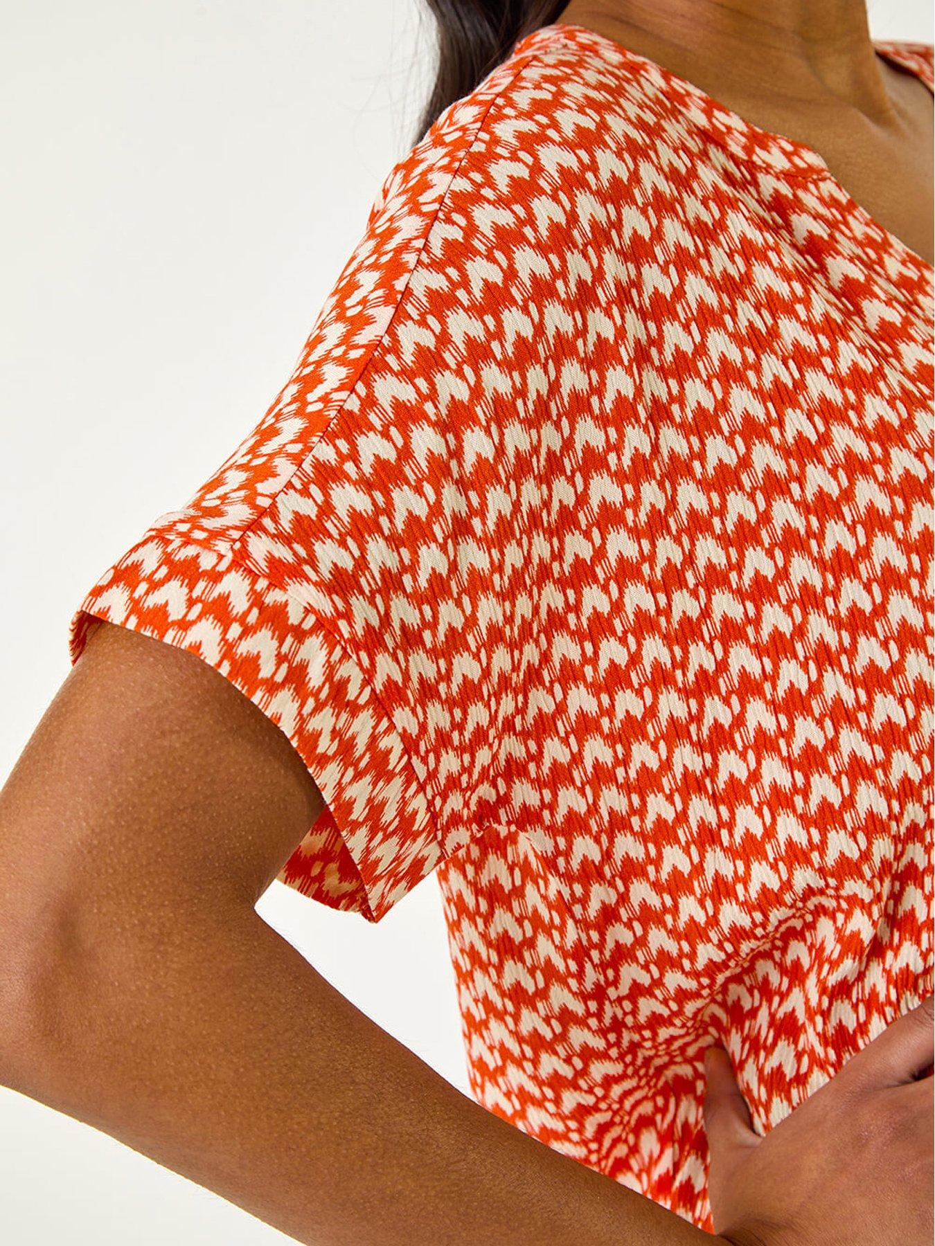 roman-abstract-print-tunic-top-orangedetail