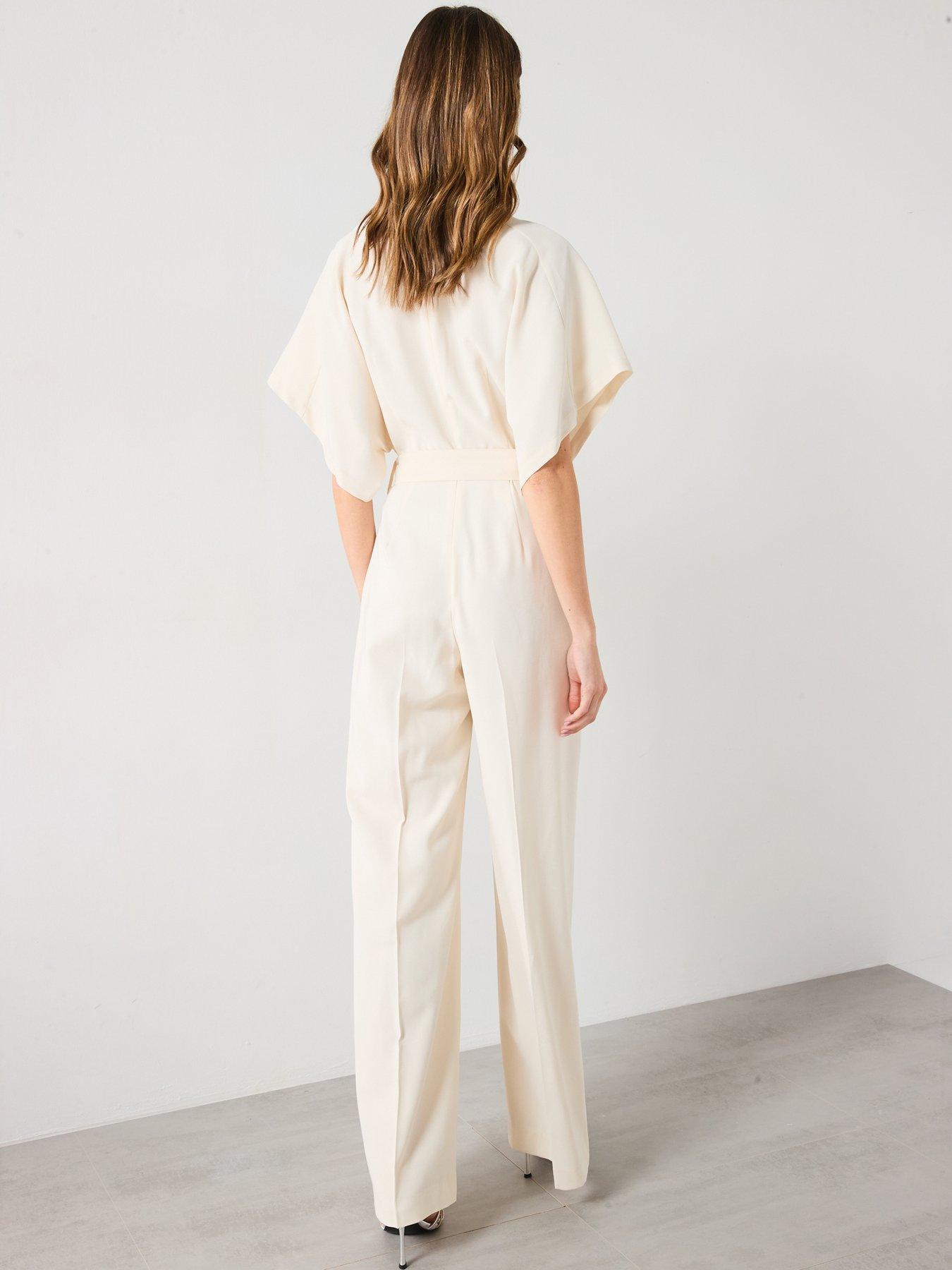 mango-long-jumpsuit-with-belt-and-buckle-creamstillFront