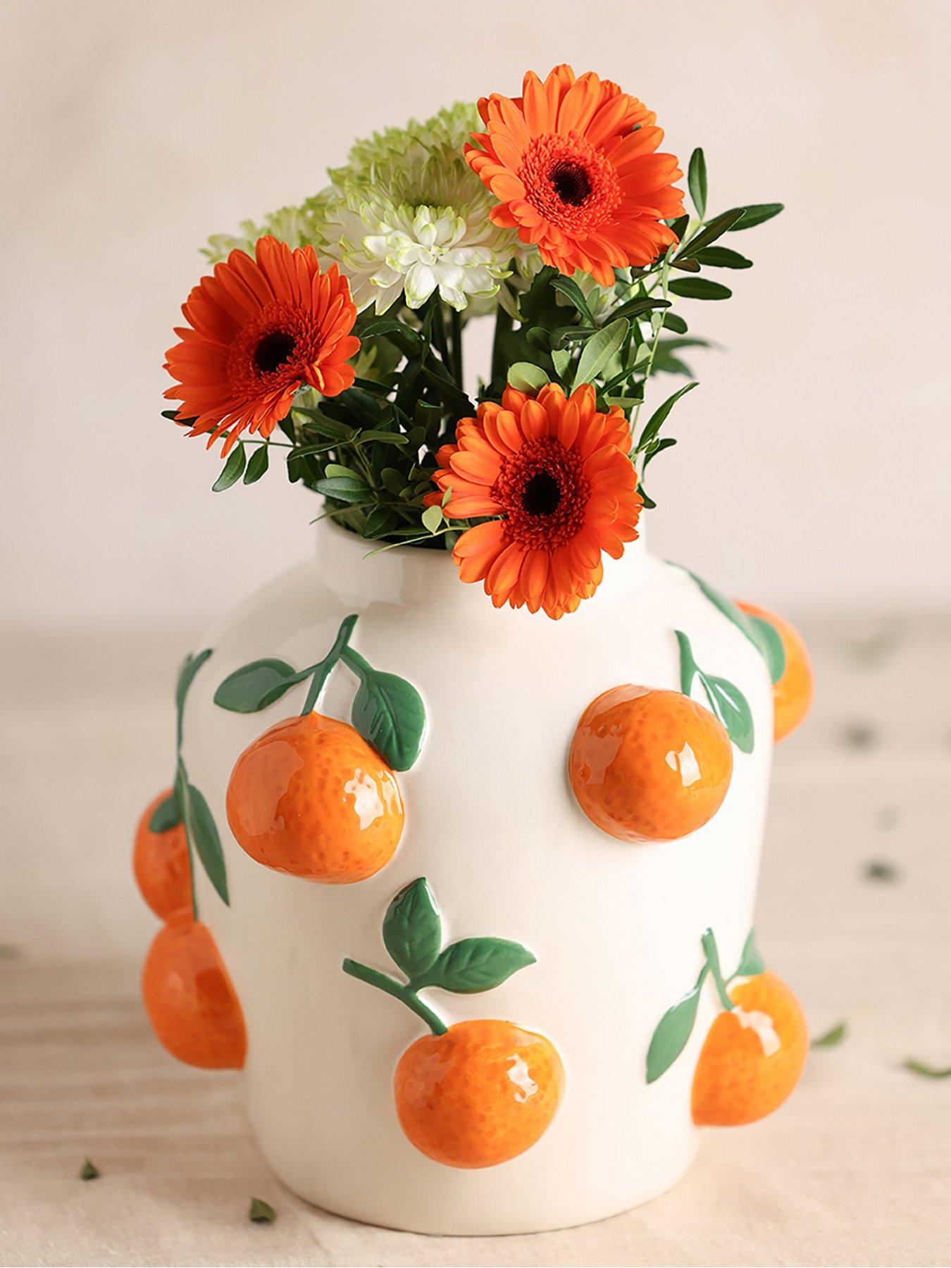hestia-hestia-white-vase-with-oranges