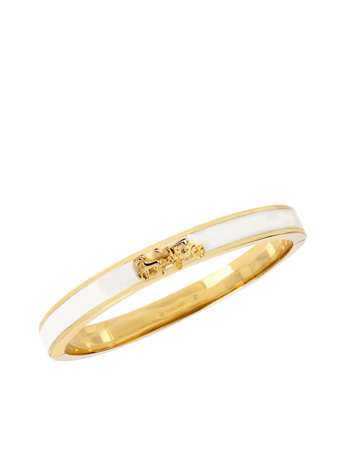 Image 1 of 3 of COACH Horse &amp; Carriage Enamel Hinged Bangle Bracelet - Gold