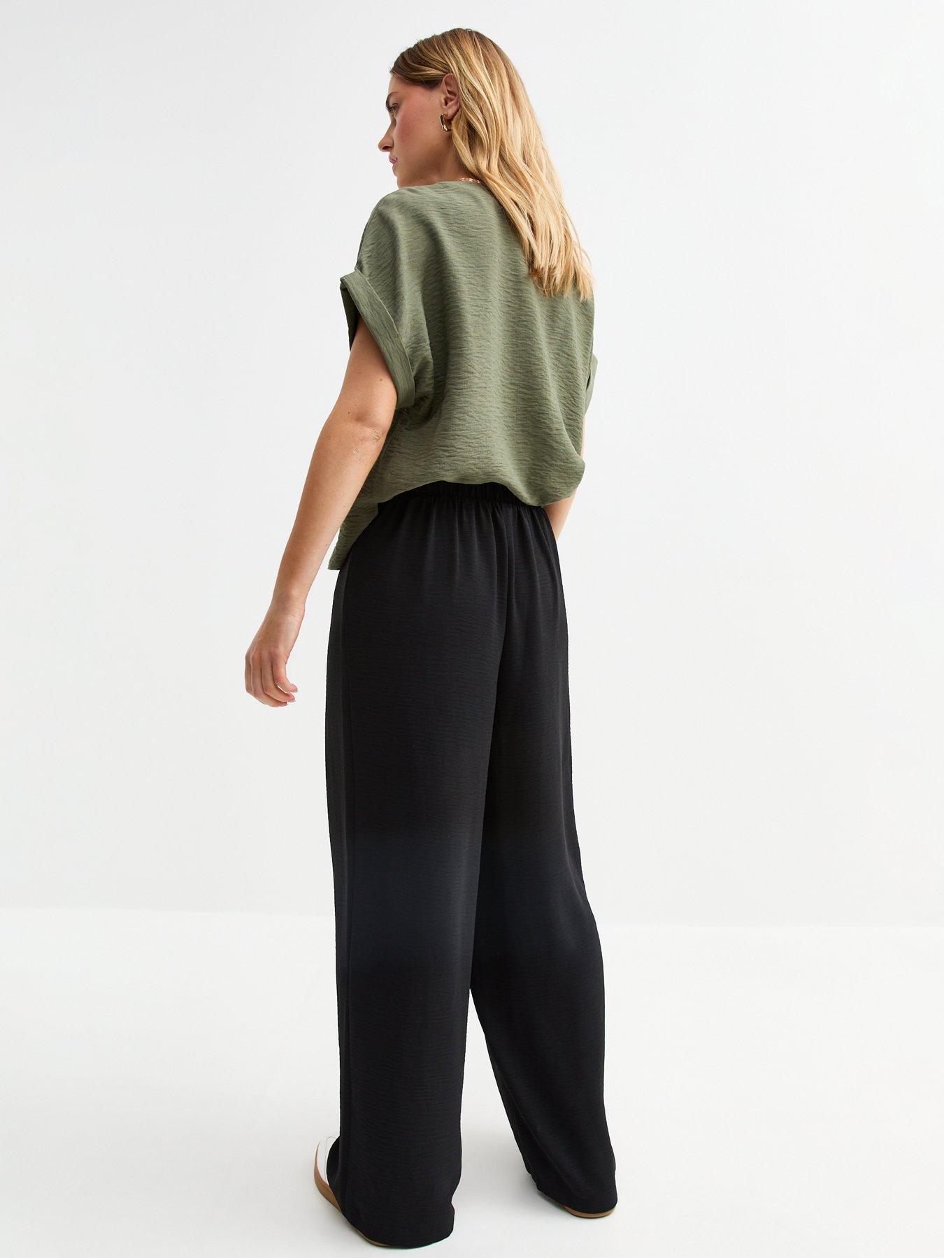 Image 2 of 5 of New Look Black Pleated Front Wide Leg Trousers