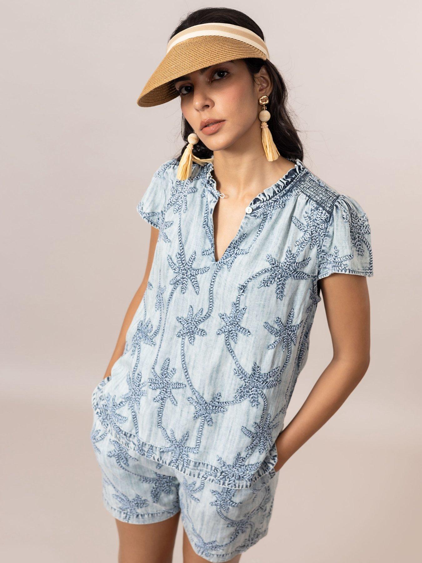 emily-lovelock-ada-palm-print-denim-short-blue