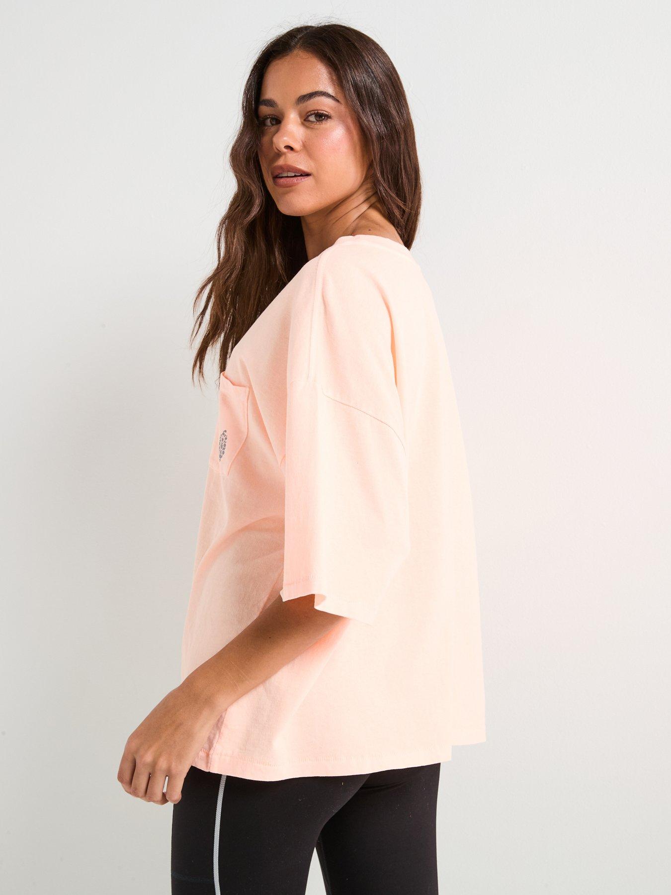 fp-movement-womens-training-logo-tackle-tee-pinkstillFront