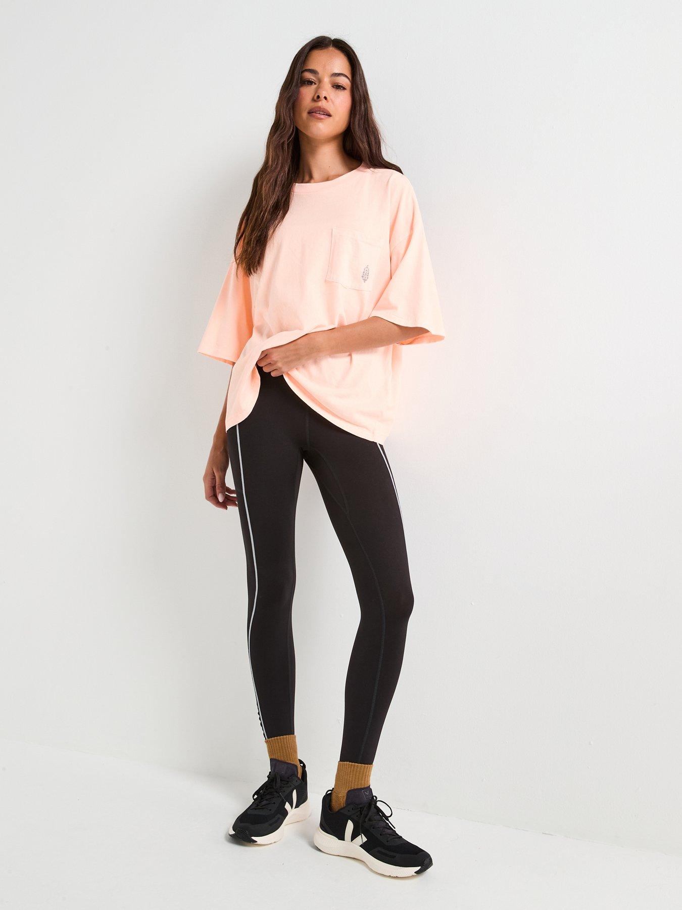 fp-movement-womens-training-logo-tackle-tee-pinkback