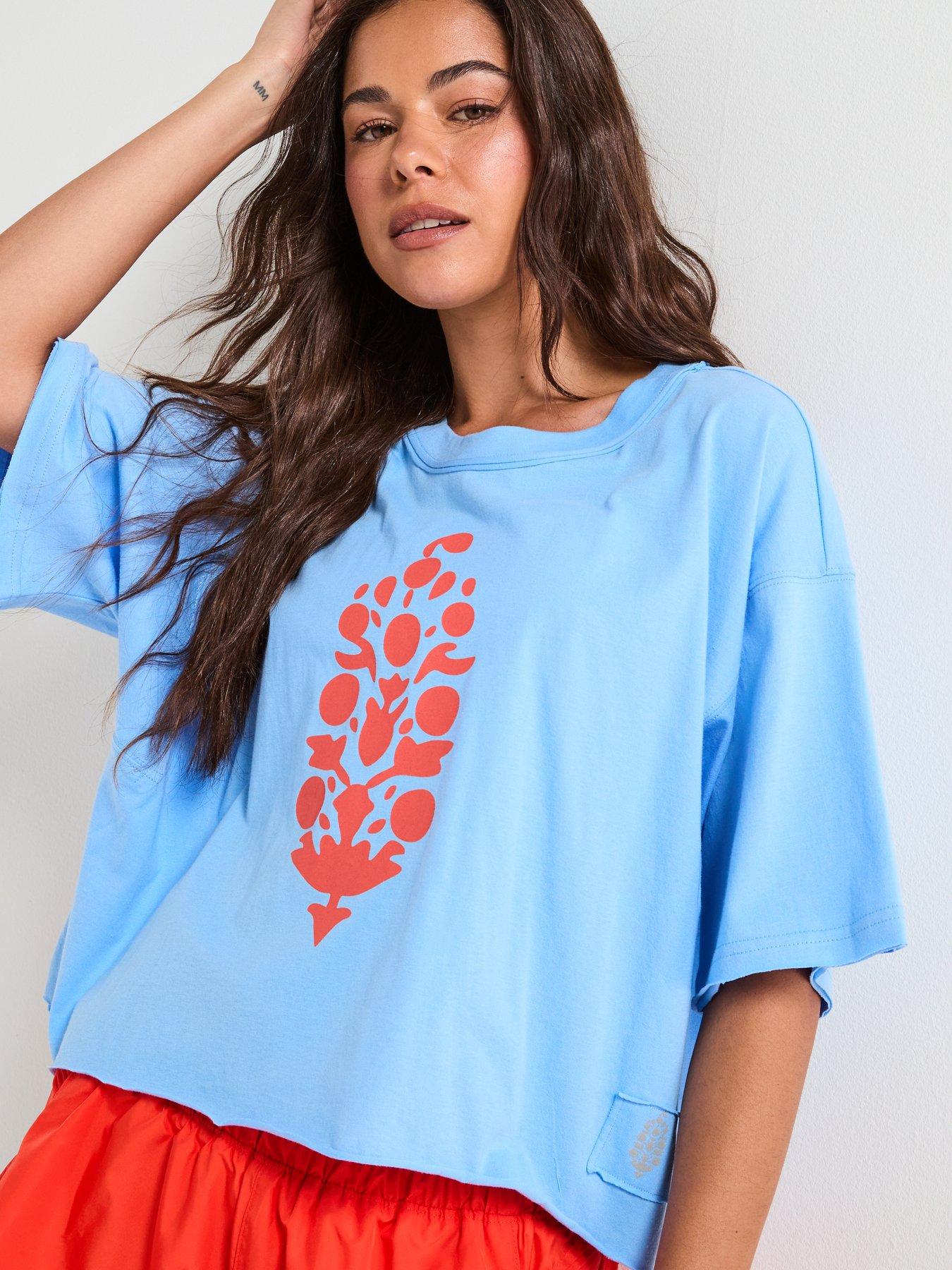 fp-movement-womens-training-inspire-tee-logo-iss-bluedetail