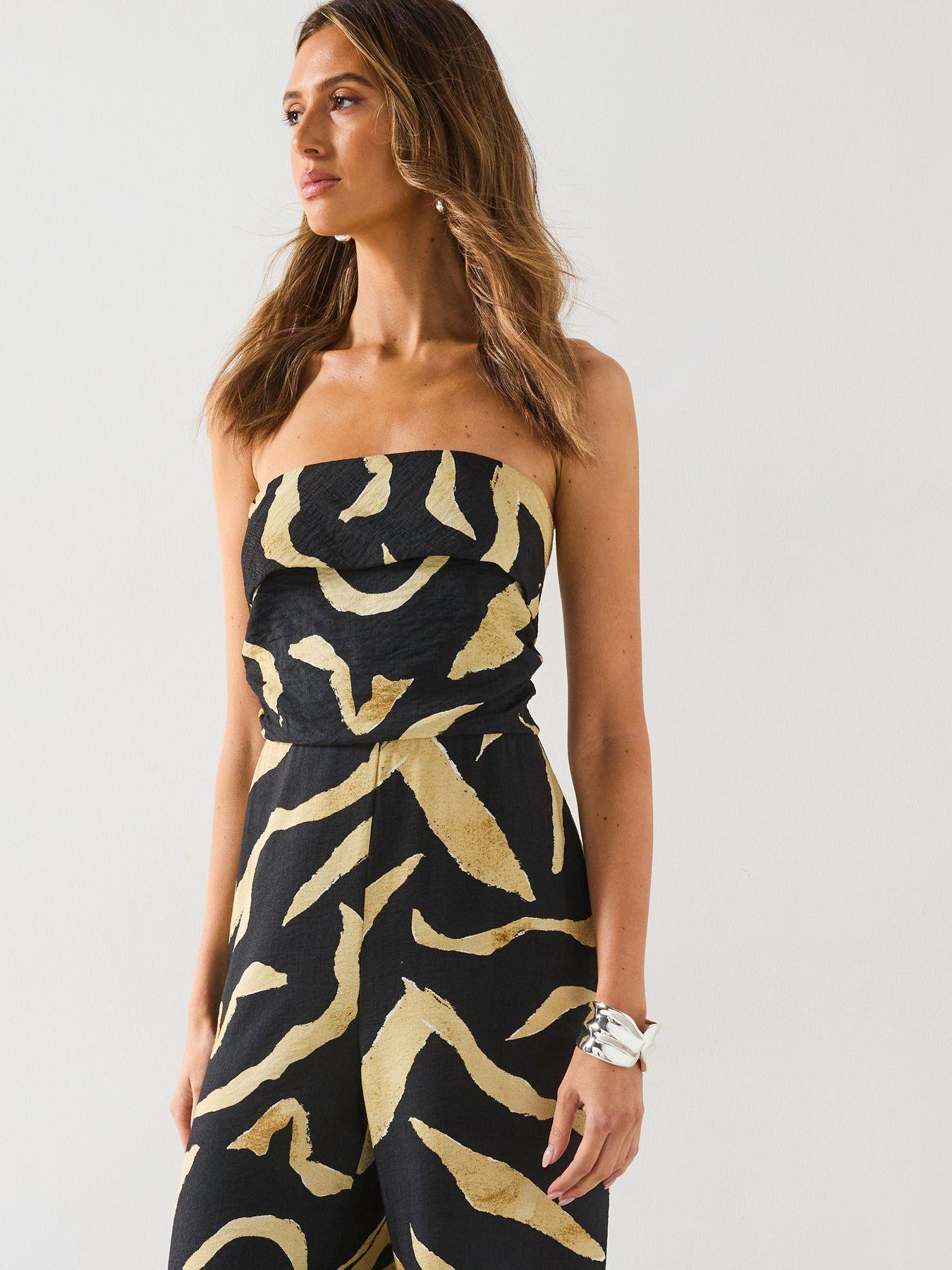 Image 4 of 6 of Mango Printed Strapless Jumpsuit - Black