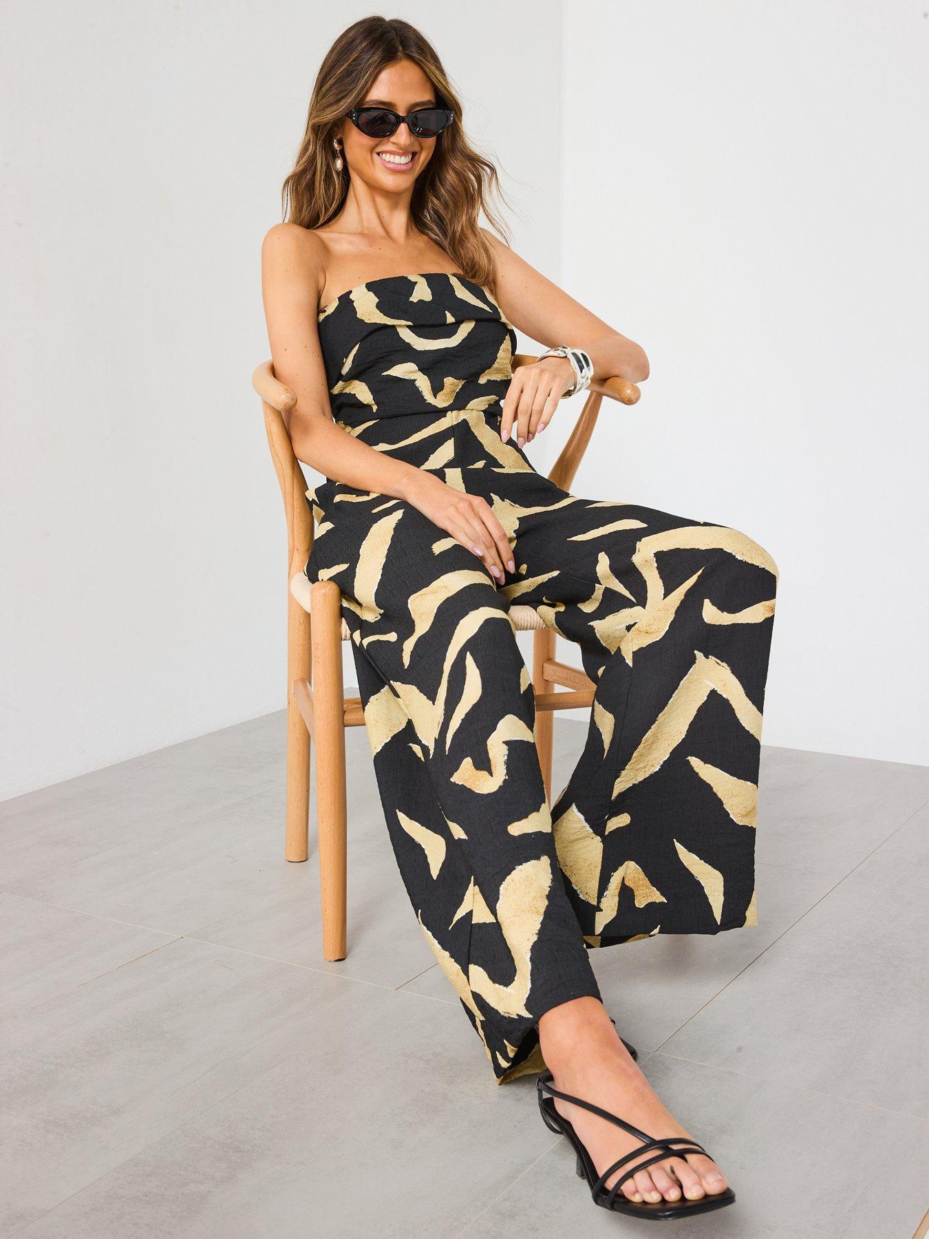 Image 6 of 6 of Mango Printed Strapless Jumpsuit - Black