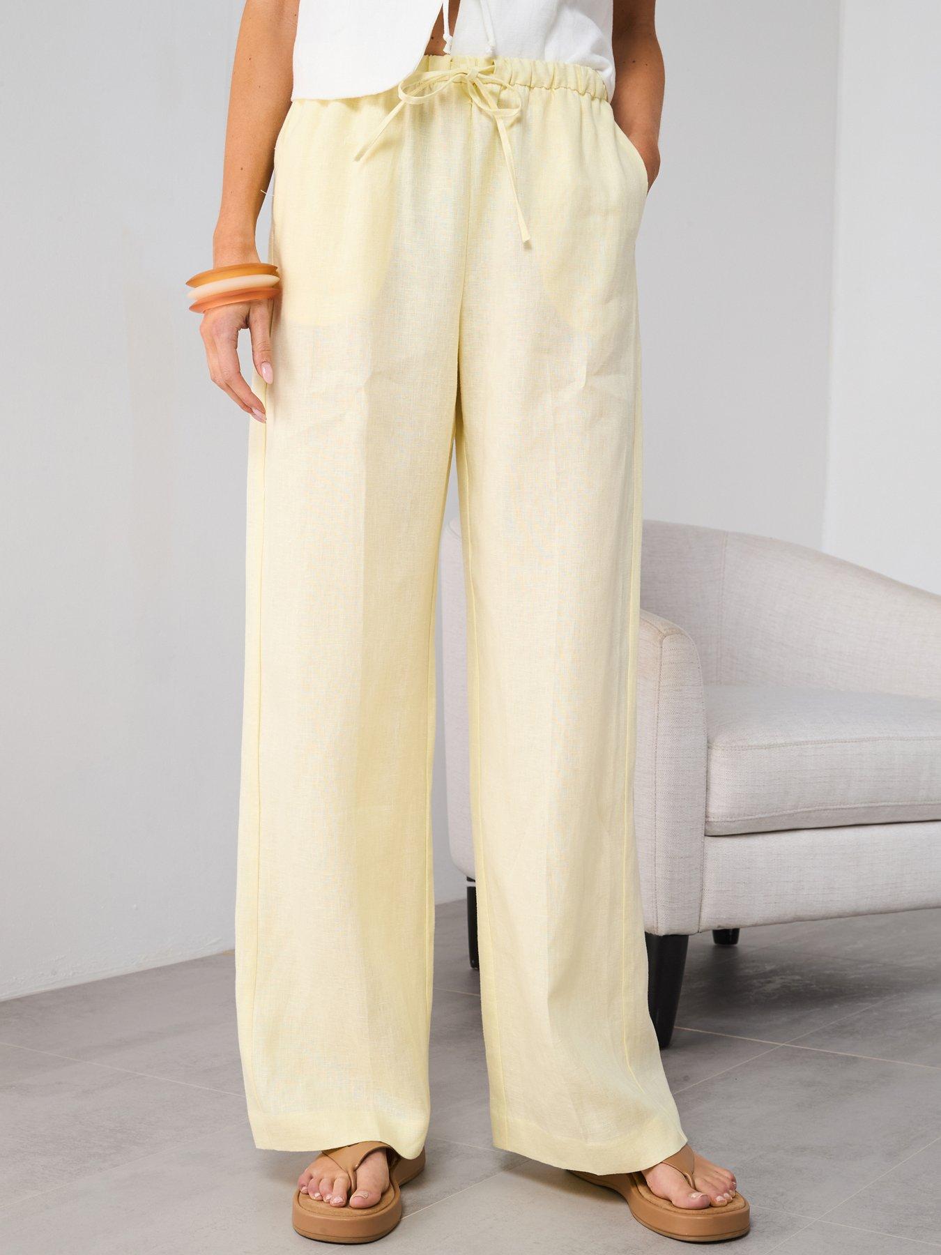 mango-straight-linen-pants-with-bow-yellow