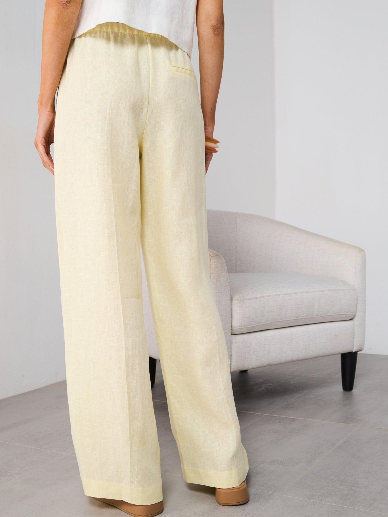mango-straight-linen-pants-with-bow-yellowstillFront