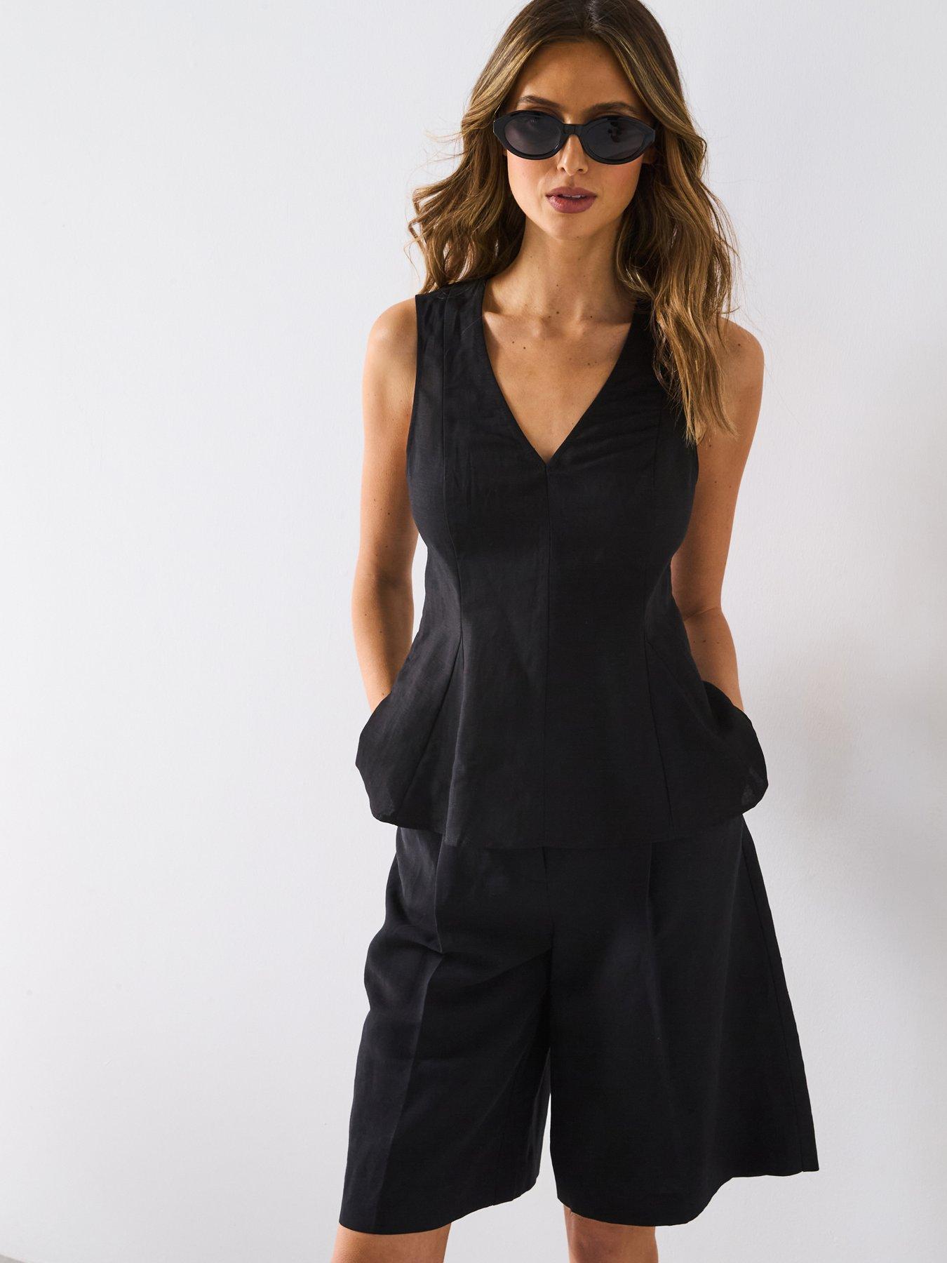 mango-linen-blend-peplum-top-black