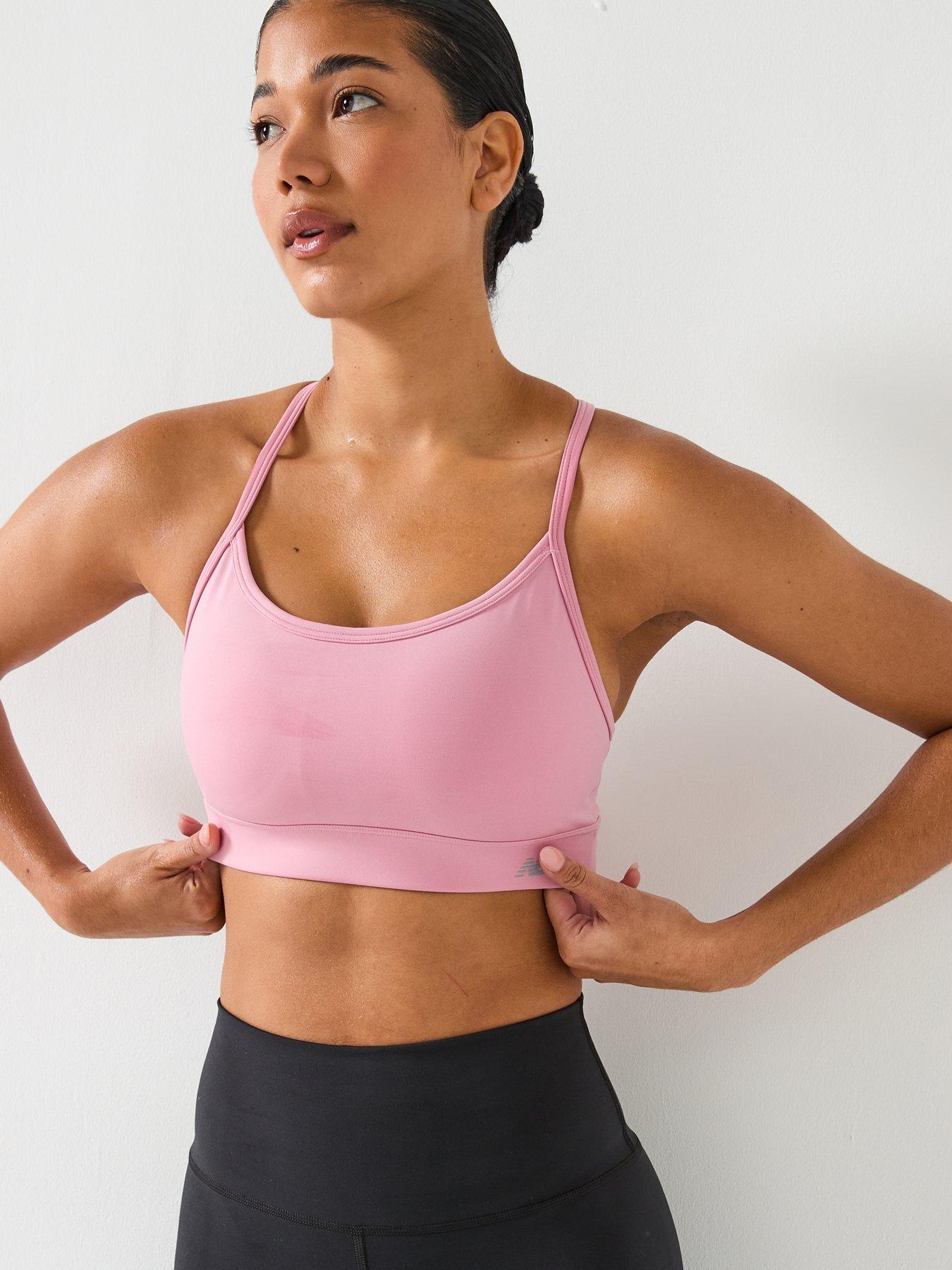 new-balance-womens-essential-yoga-bra-pink