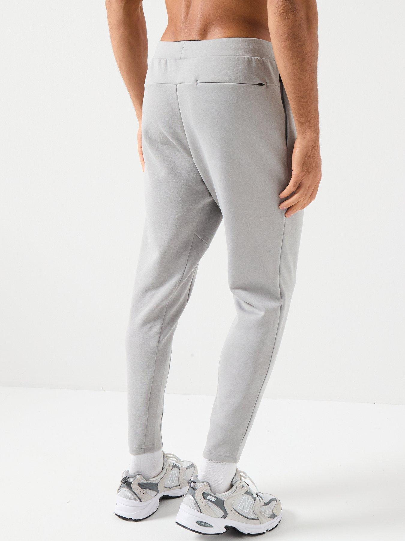 new-balance-mens-training-tech-knit-pants-greystillFront