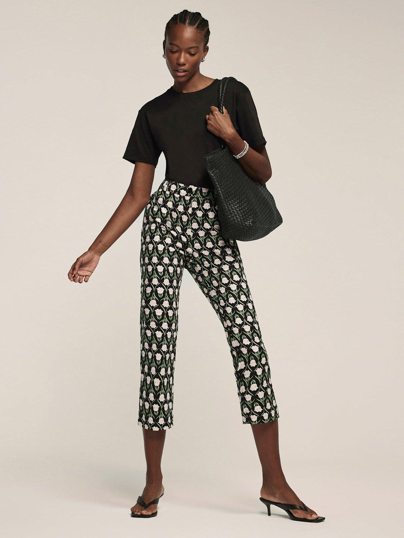 Image 1 of 6 of Mint Velvet Floral Print Capri Trousers - Black