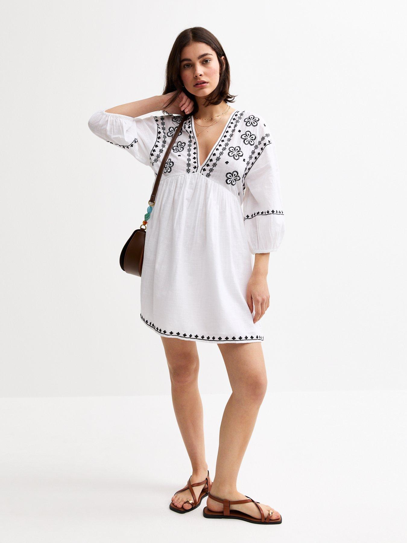 Image 3 of 4 of New Look Floral Embroidered Smock Mini Dress - White