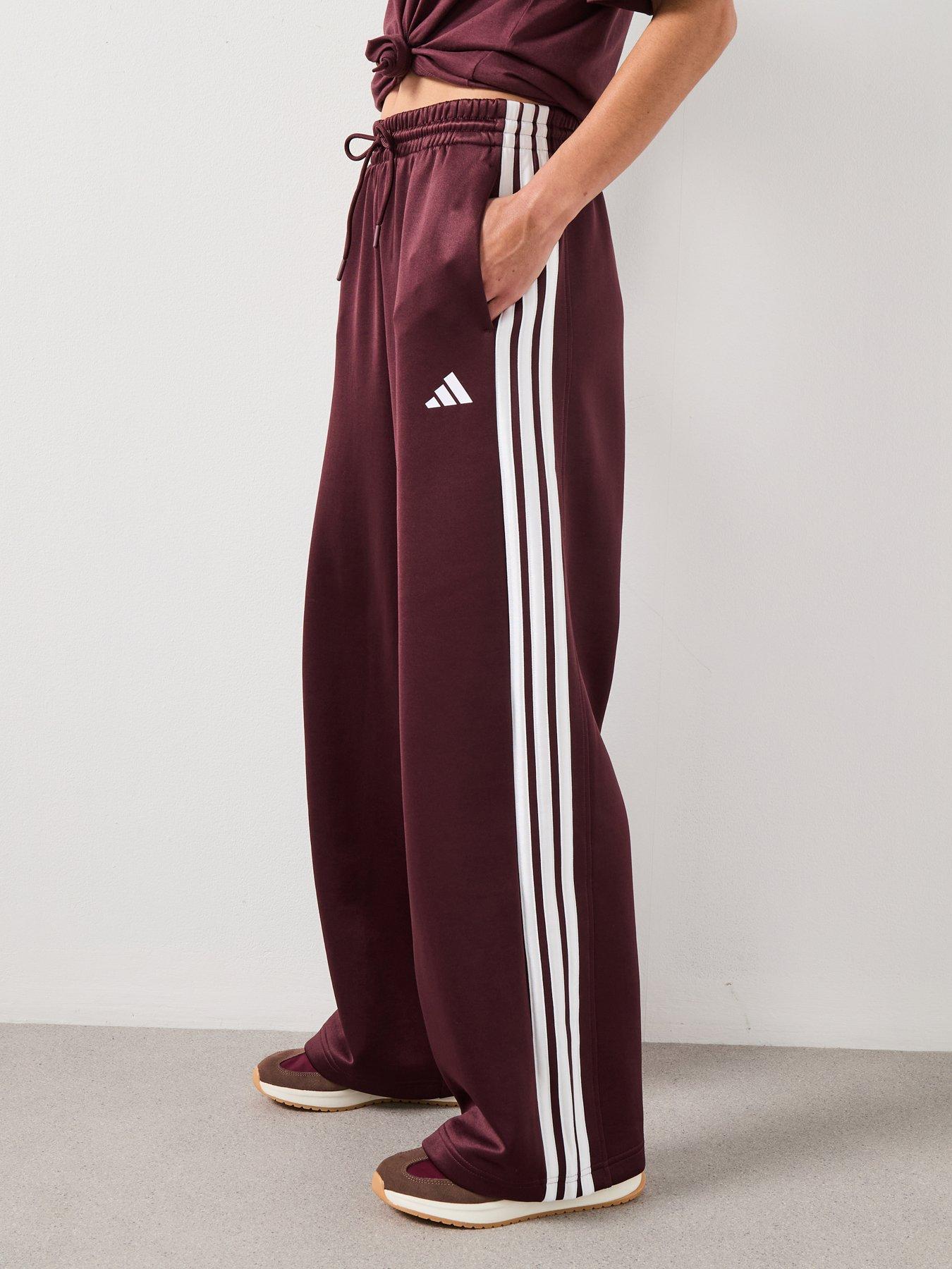 Image 1 of 6 of adidas Sportswear Women's Stadium Tracksuit Pants- Aurora Ruby - Red