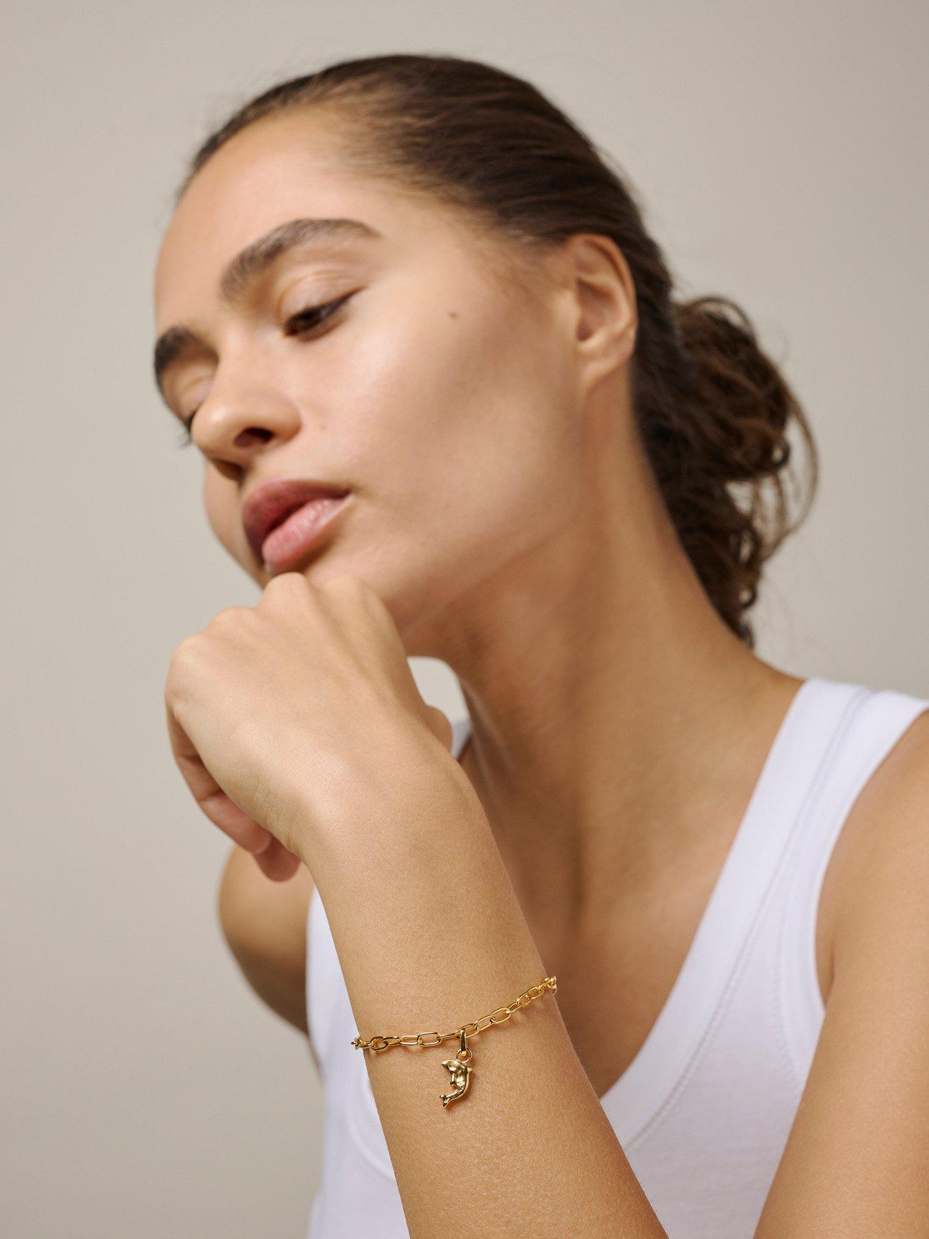 enamel-copenhagen-joyful-dolphin-gold-charmstillFront