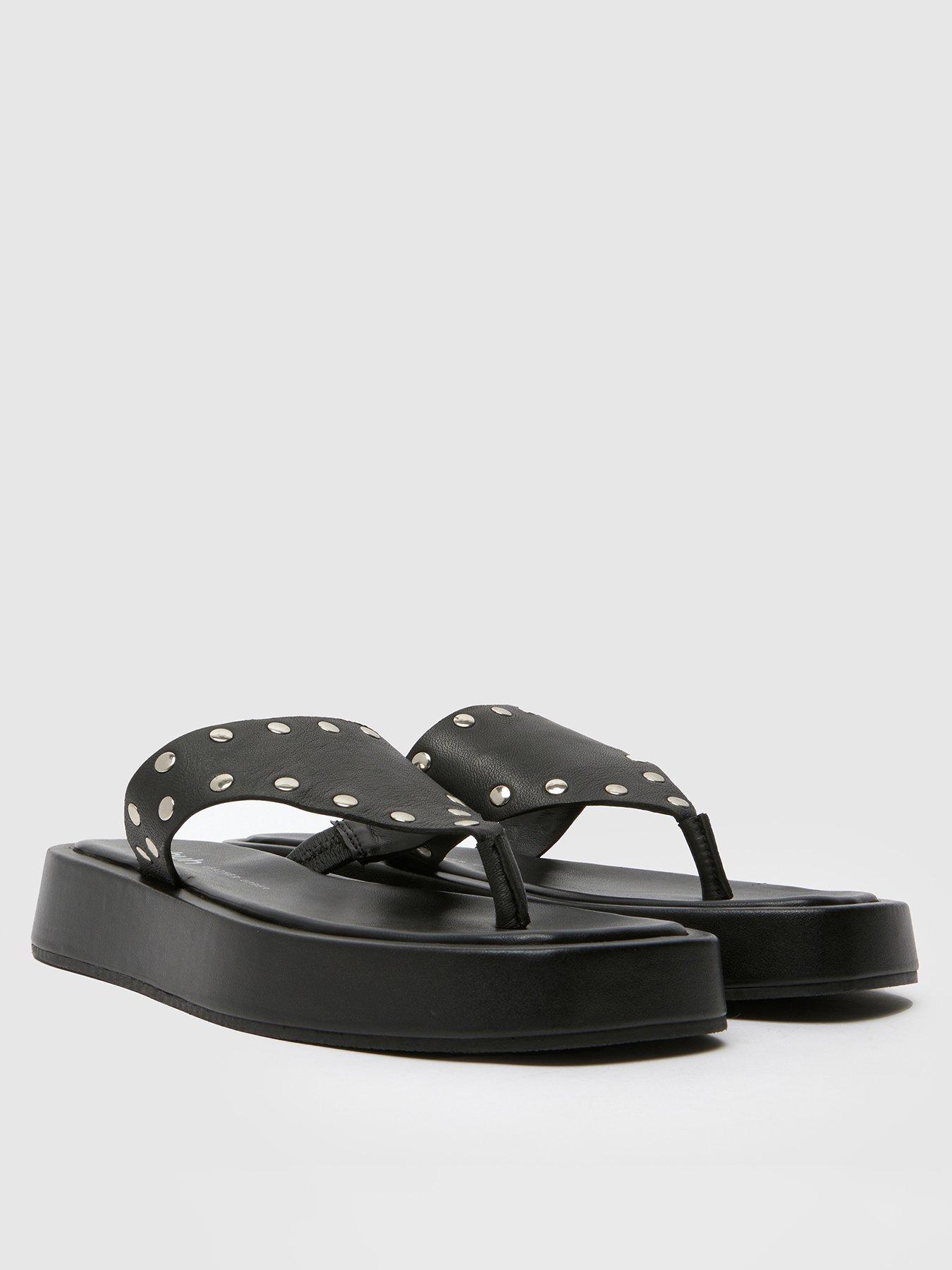 schuh-toryn-stud-toe-post-sandal-blackstillFront