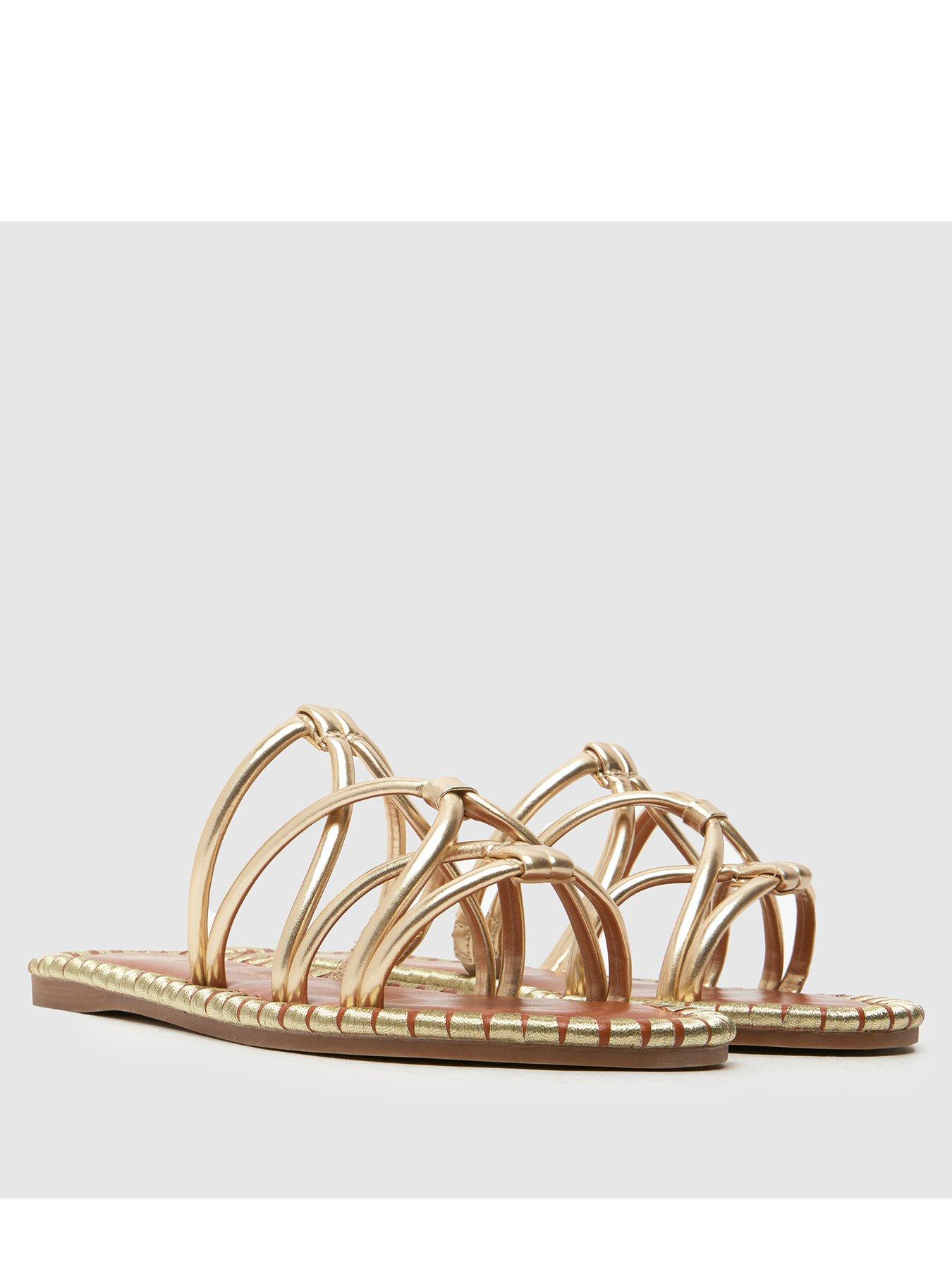 schuh-tevin-feature-rand-flat-sandals-goldstillFront