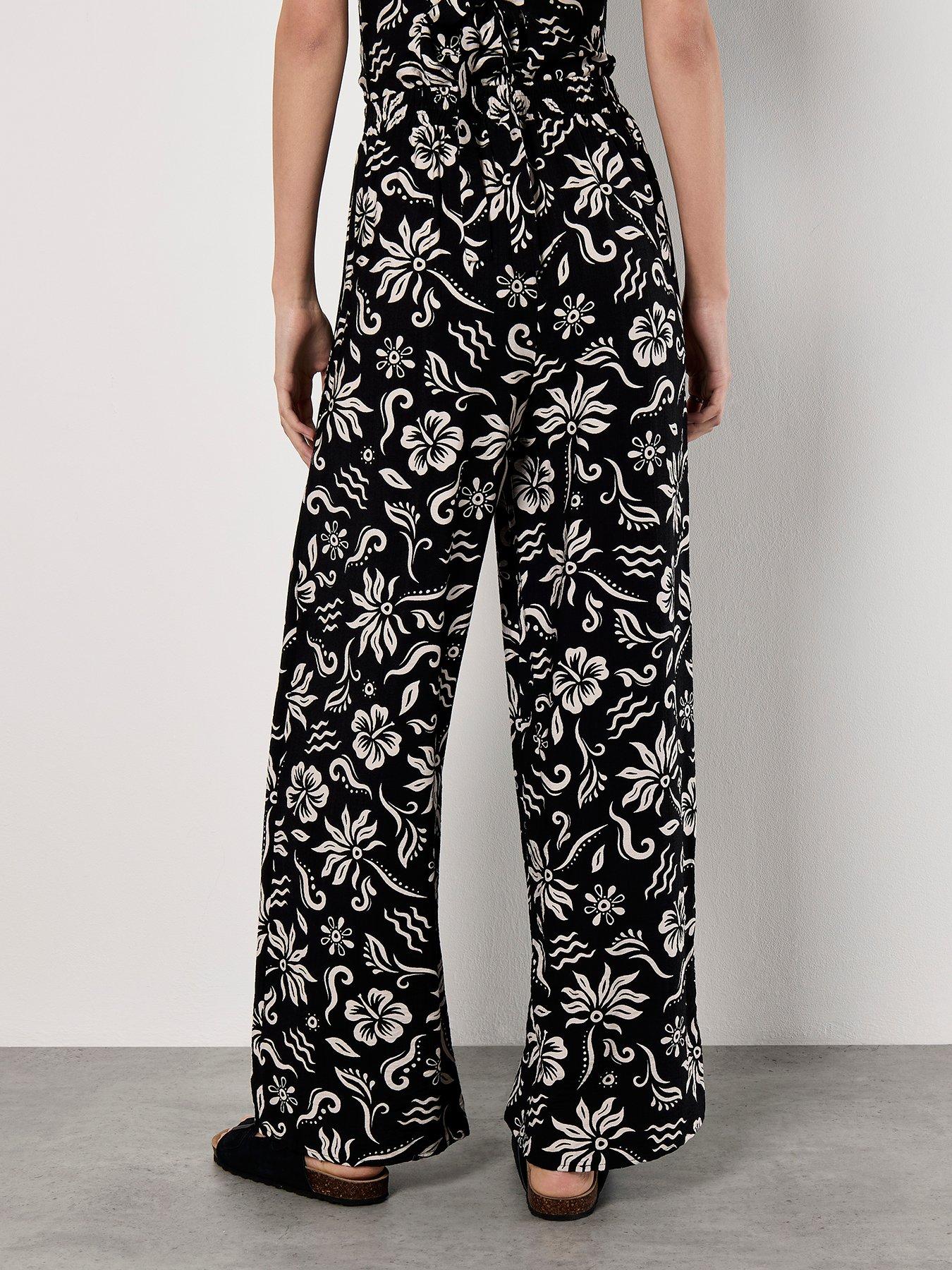 apricot-tropical-mono-wrap-trousers-blackstillFront
