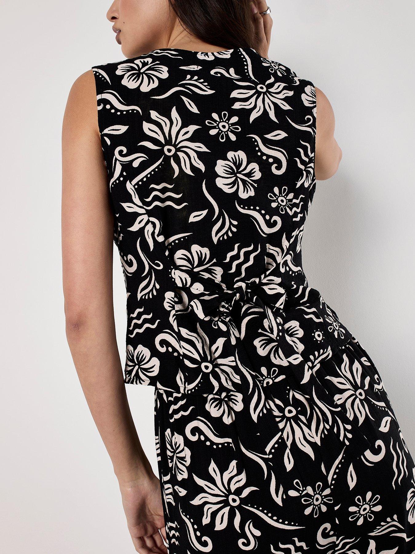 apricot-tropical-mono-corset-top-blackstillFront