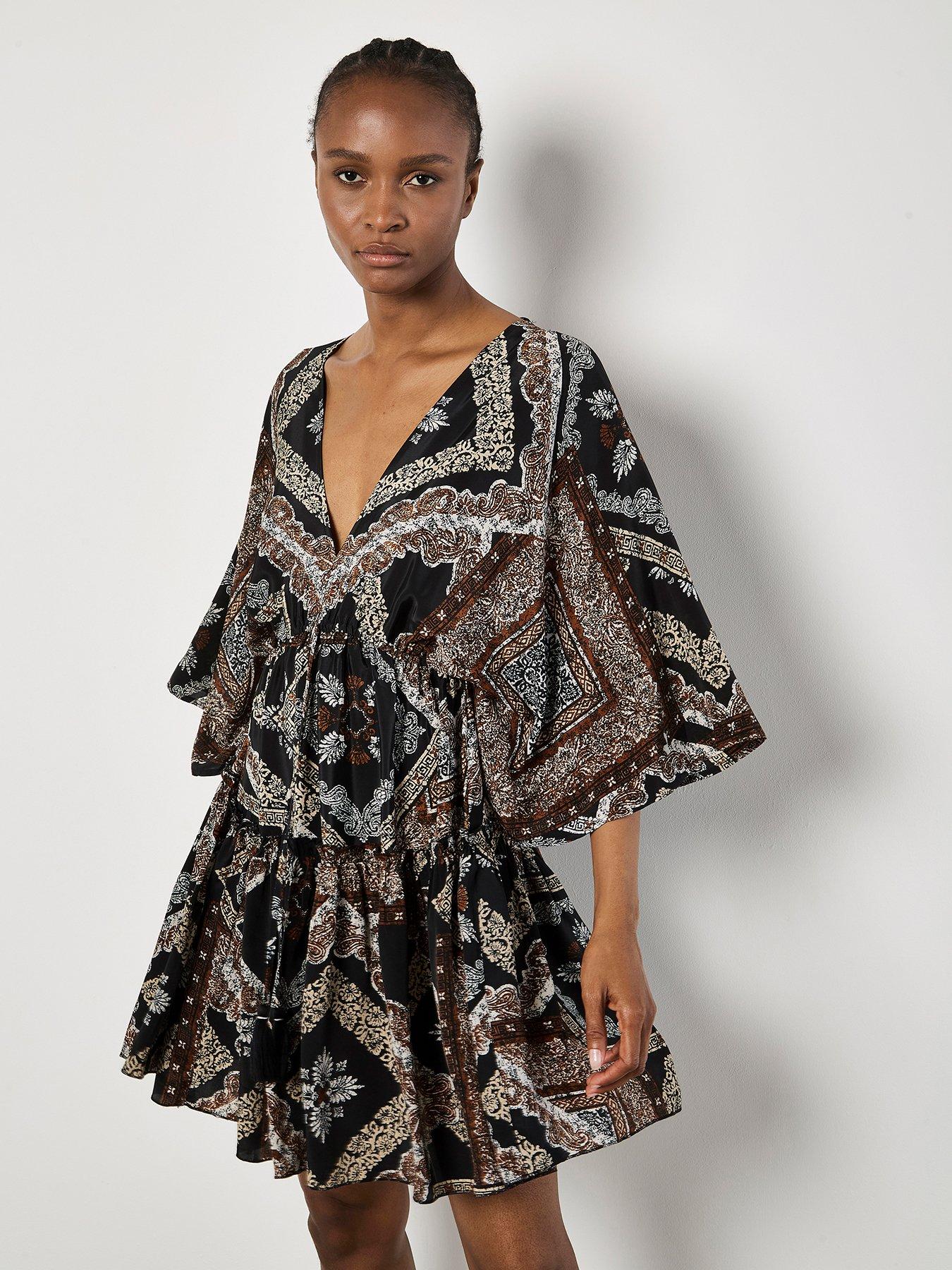 apricot-distressed-tassel-kaftan-dress-blackfront