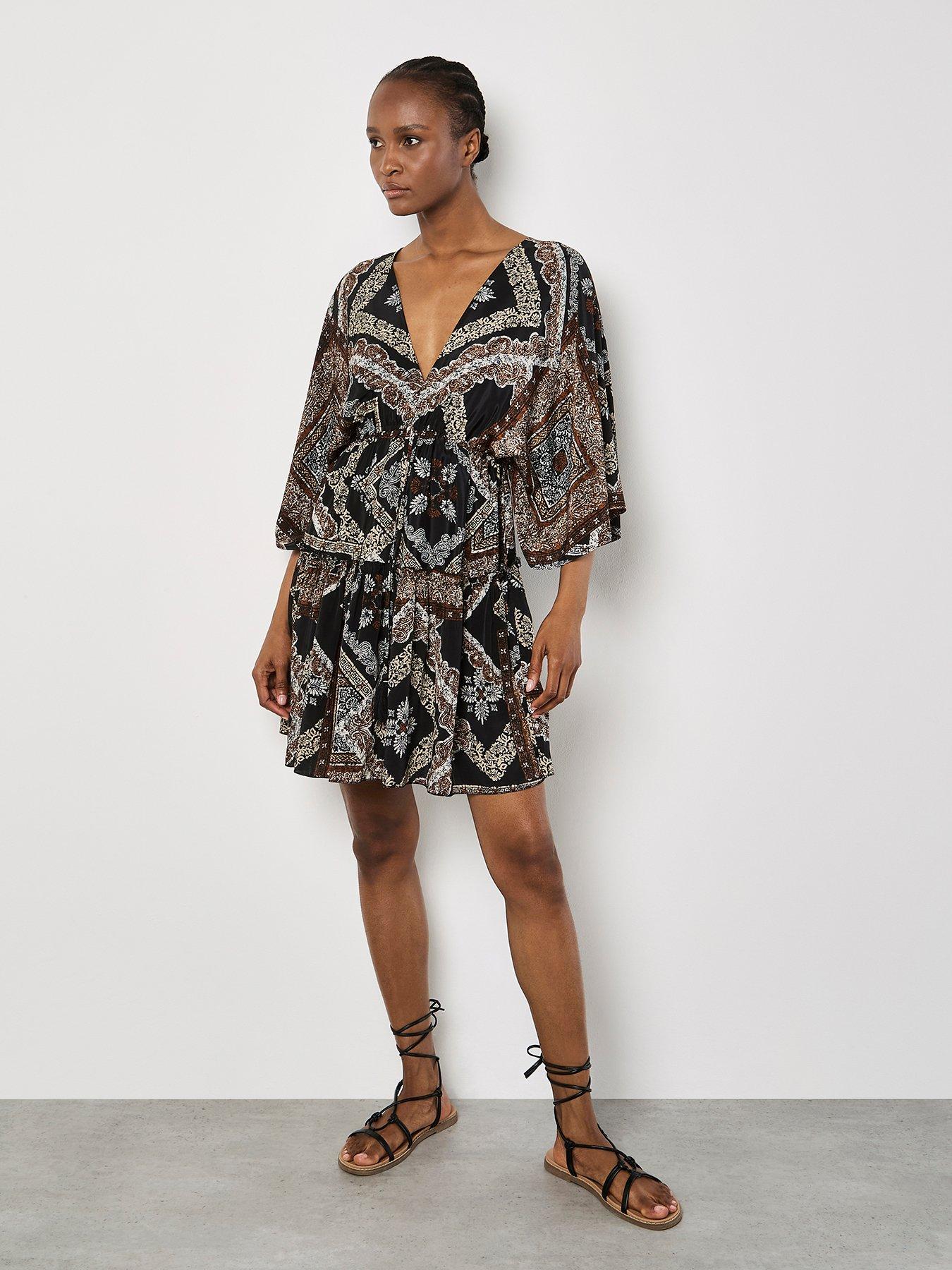apricot-distressed-tassel-kaftan-dress-blackback