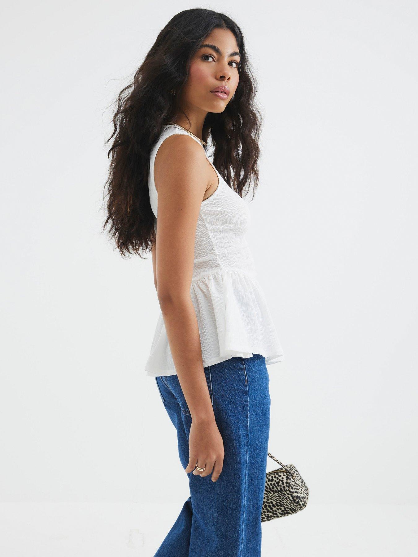 river-island-textured-peplum-racer-top-whitestillFront