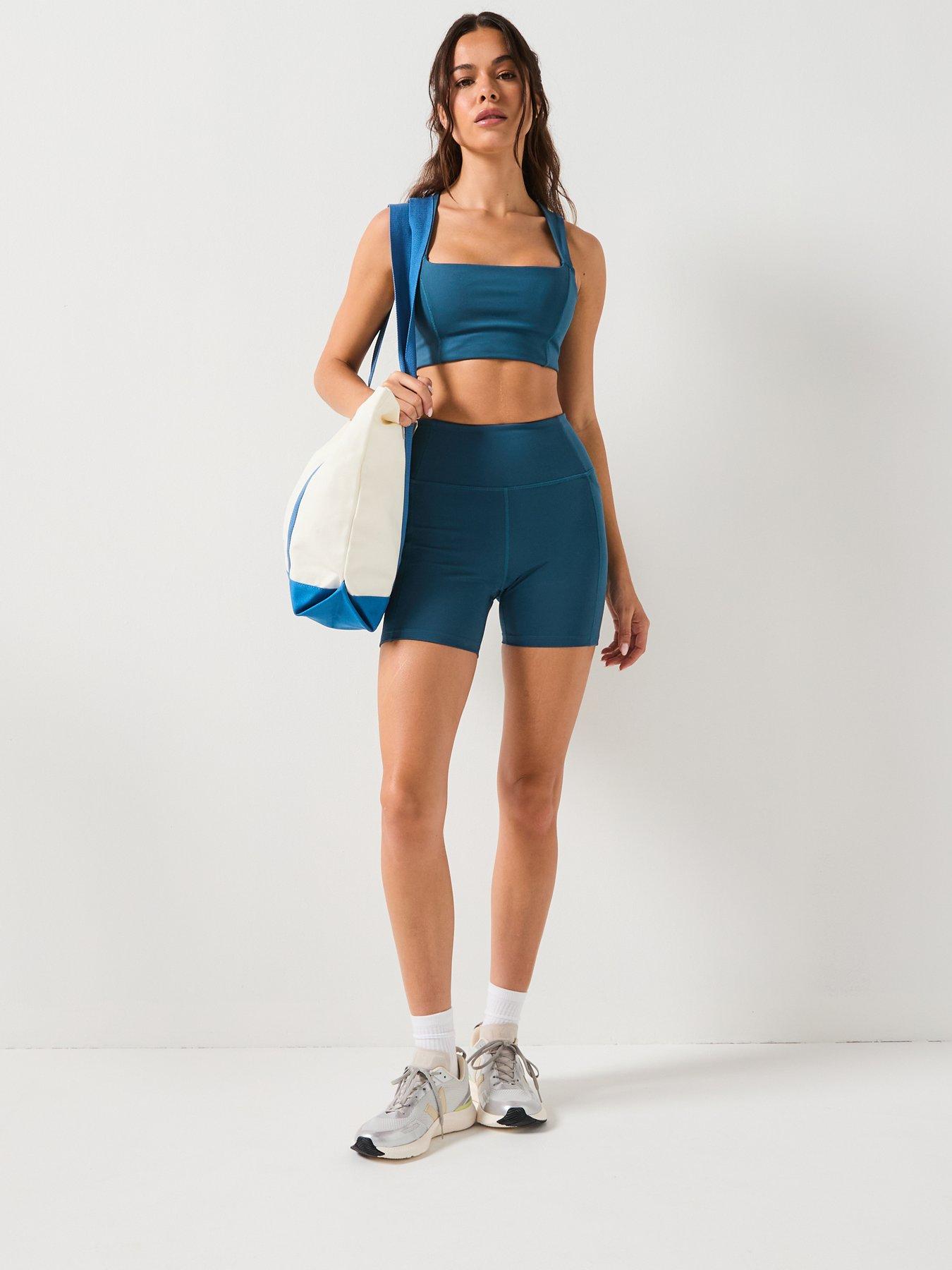 girlfriend-collective-womens-training-natalie-seamed-bra-open-back-blueback