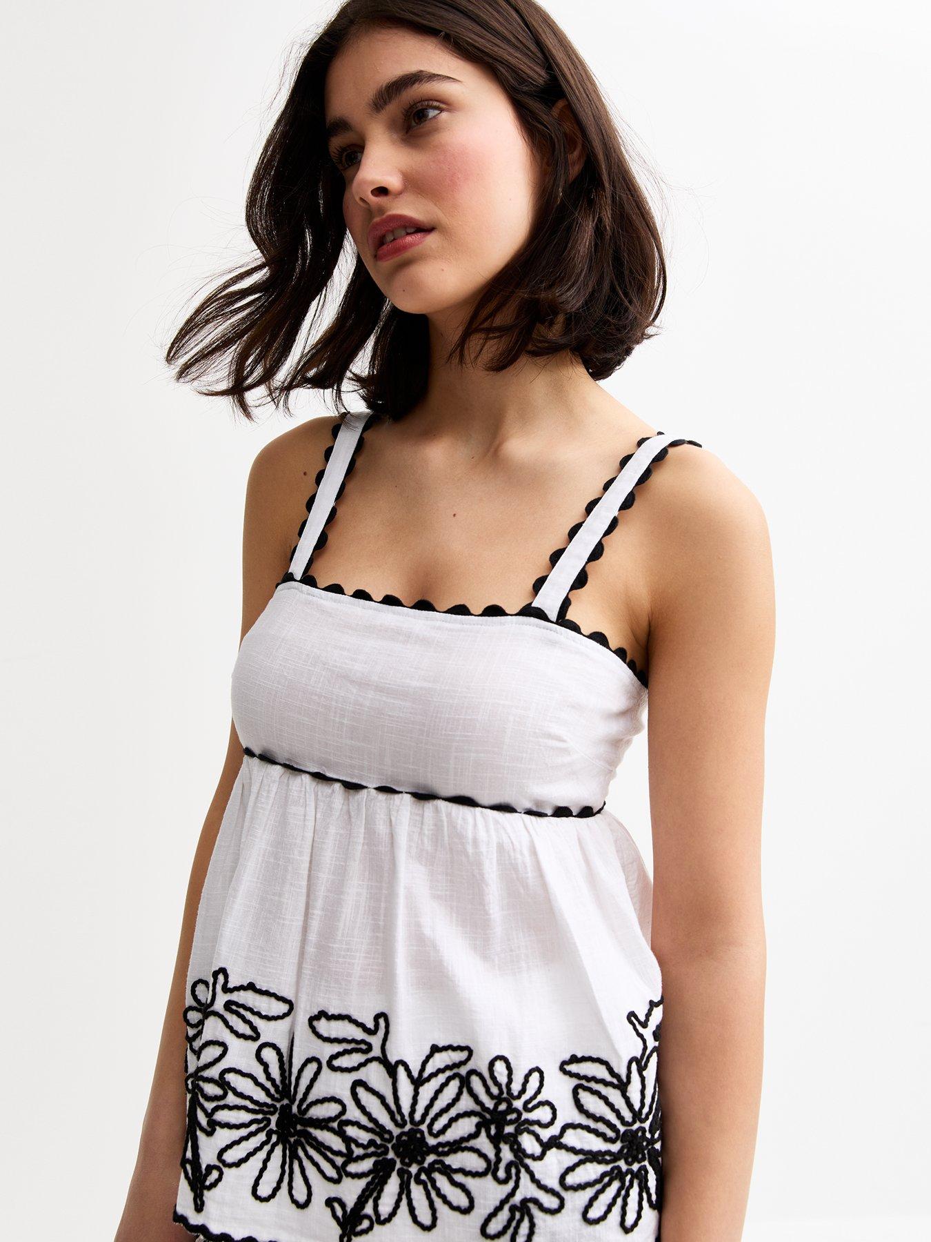 Image 1 of 4 of New Look Daisy Embroidered Cami Top - White