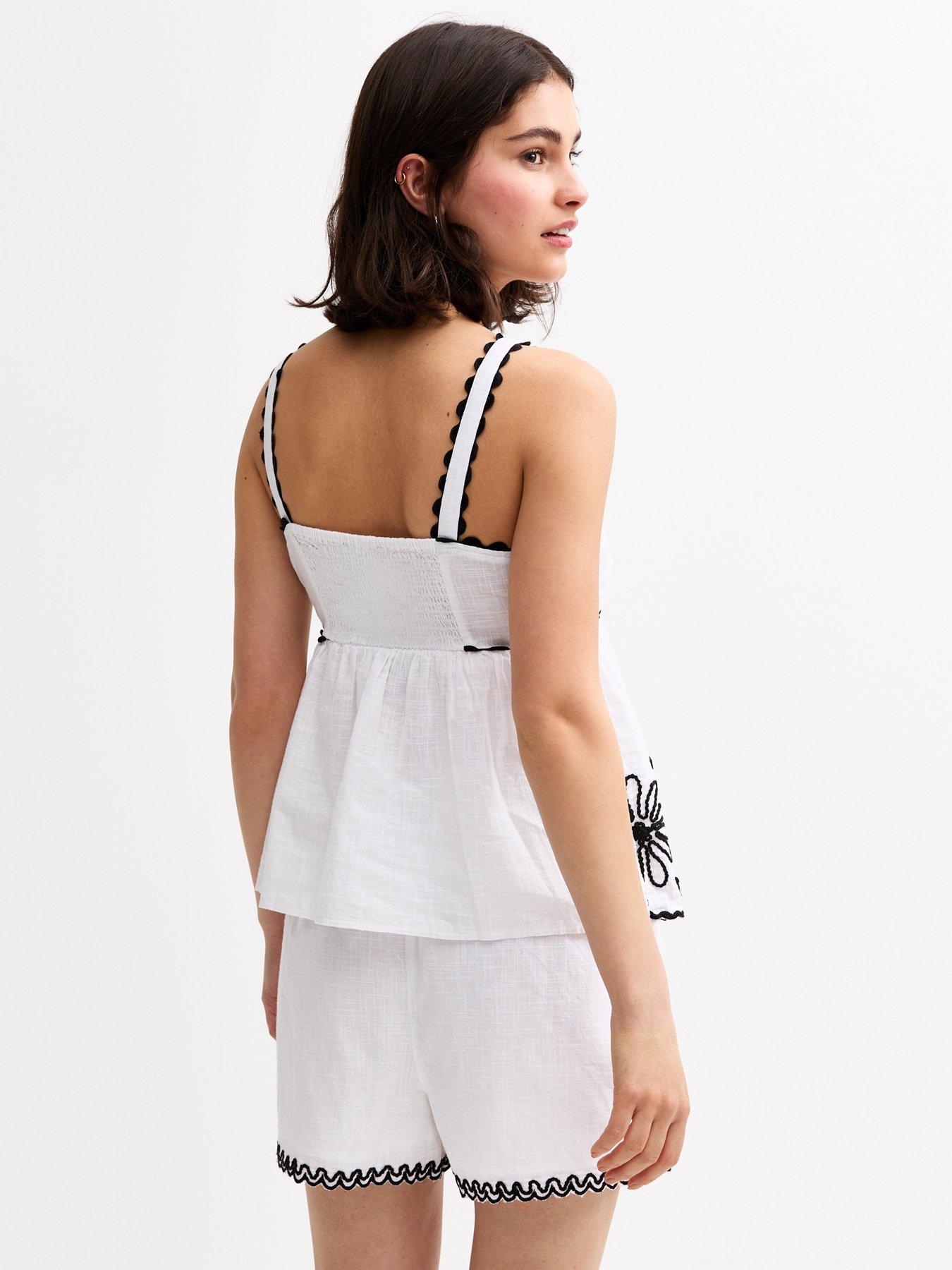 Image 2 of 4 of New Look Daisy Embroidered Cami Top - White