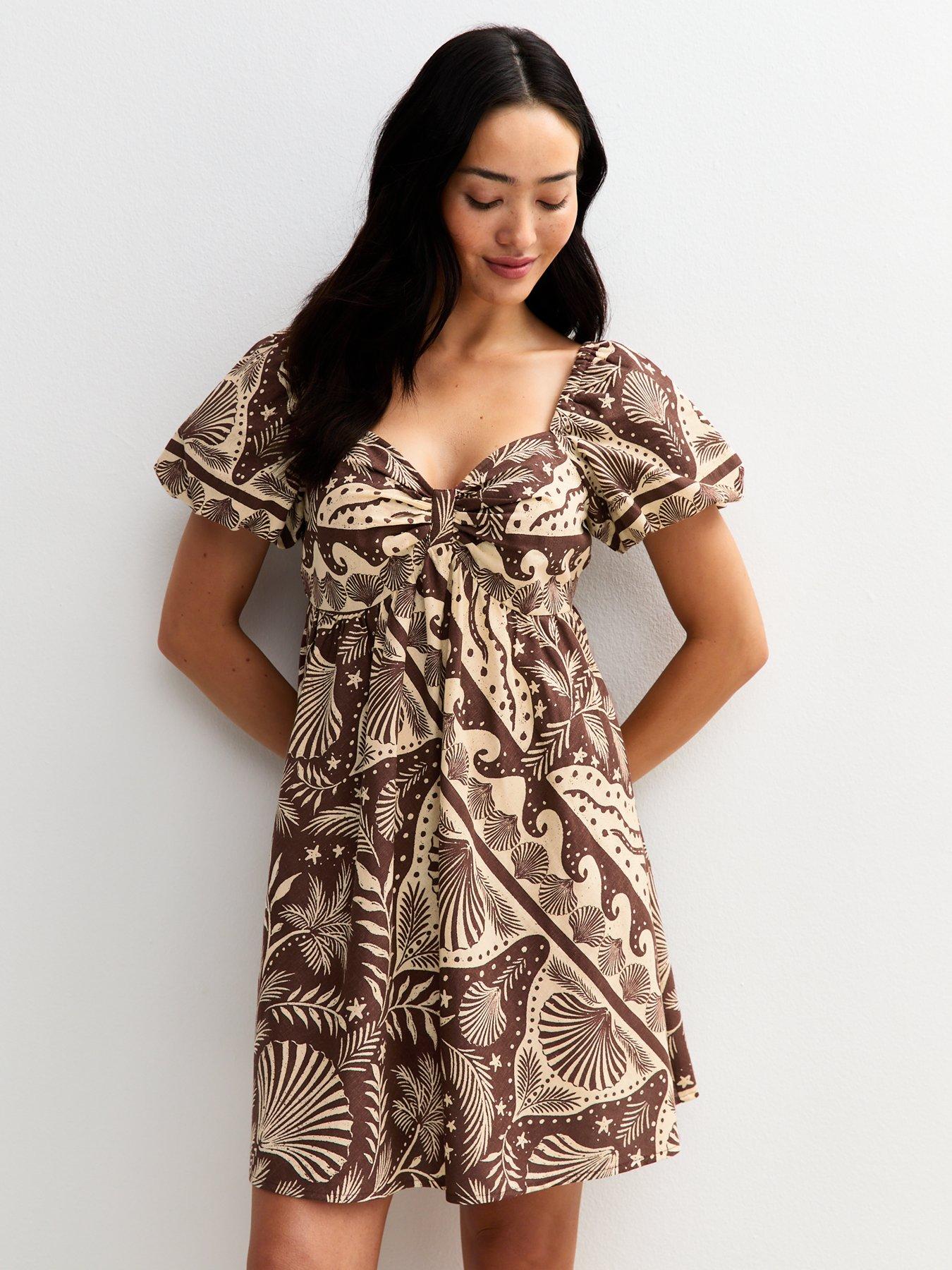 Image 1 of 4 of New Look Shell Print Puff Sleeve Mini Dress - Brown