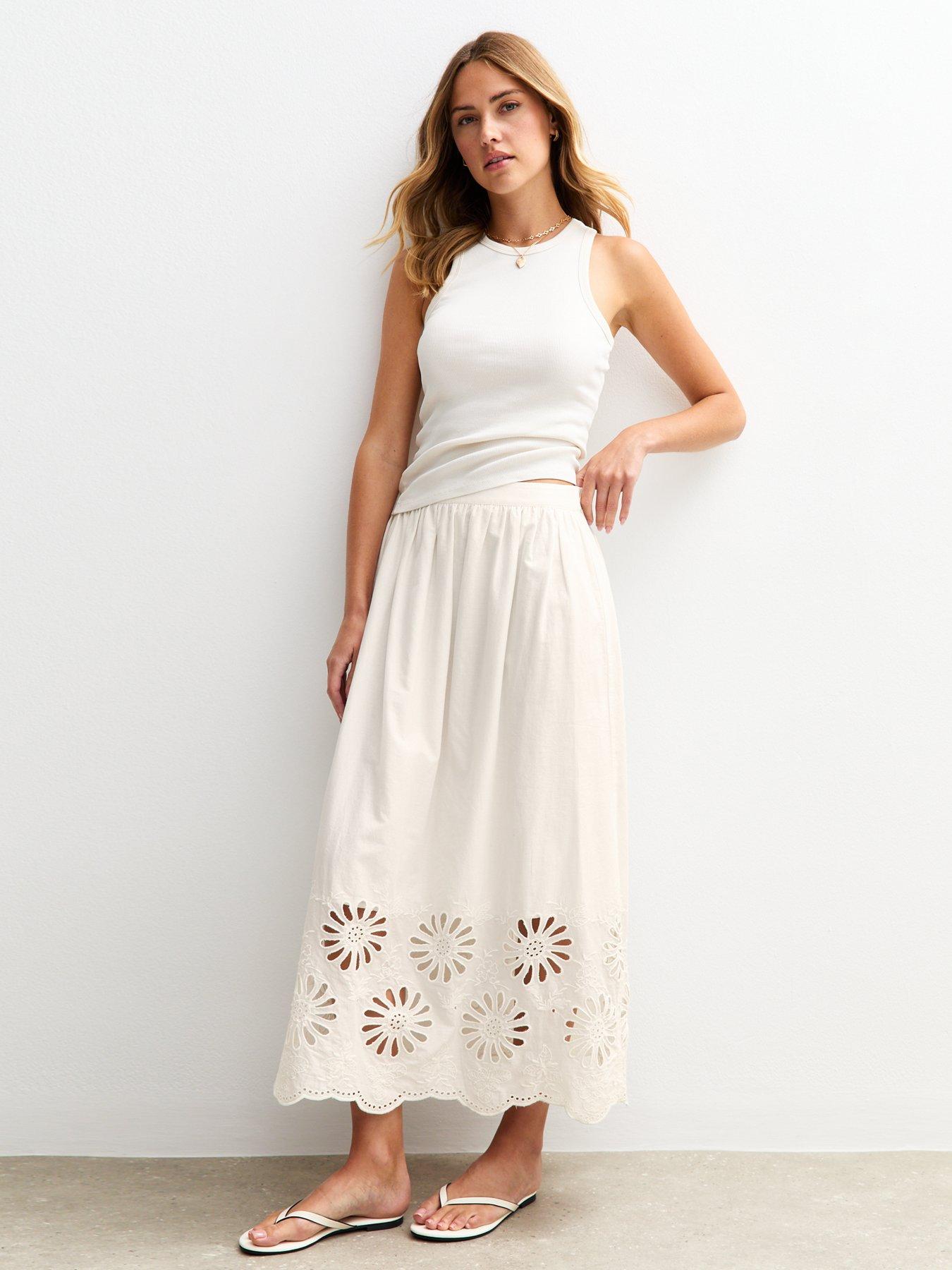 Image 1 of 4 of New Look Embroidered Cutout Hem Midi Skirt - White