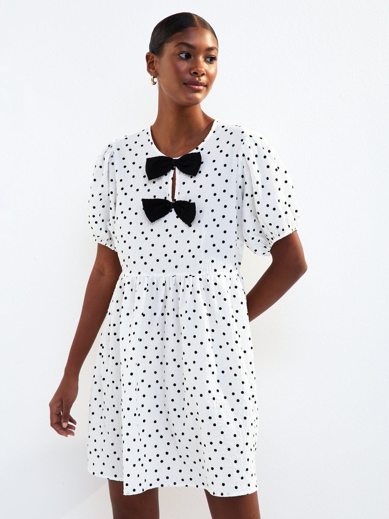 Image 3 of 4 of New Look White Bow Front Polka Dot Crinkle Texture Mini Dress