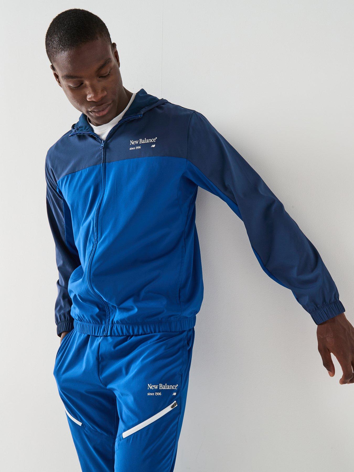 new-balance-mens-reimagined-woven-graphic-jacket-blue