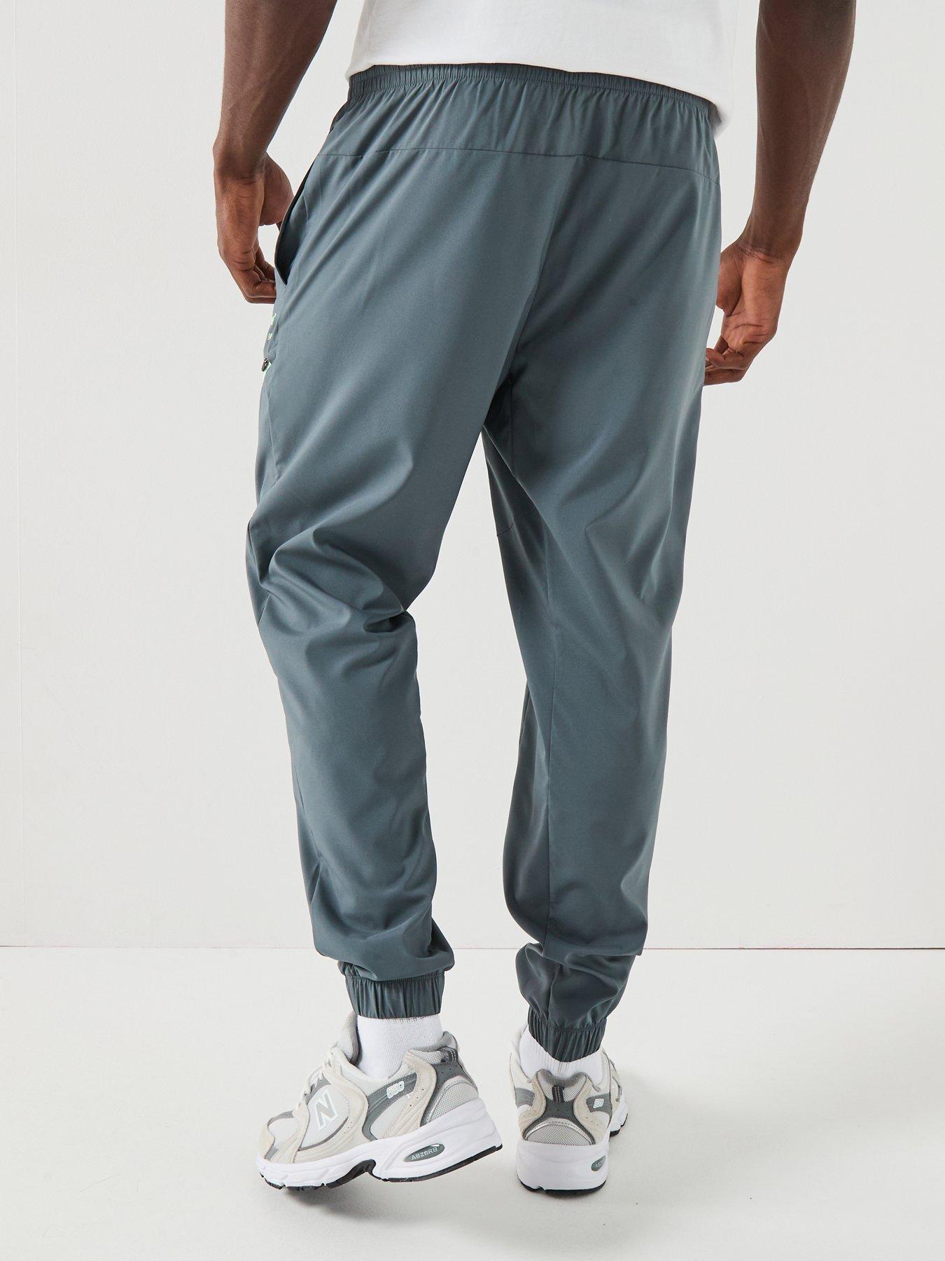 new-balance-mens-reimagined-woven-jogger-greystillFront